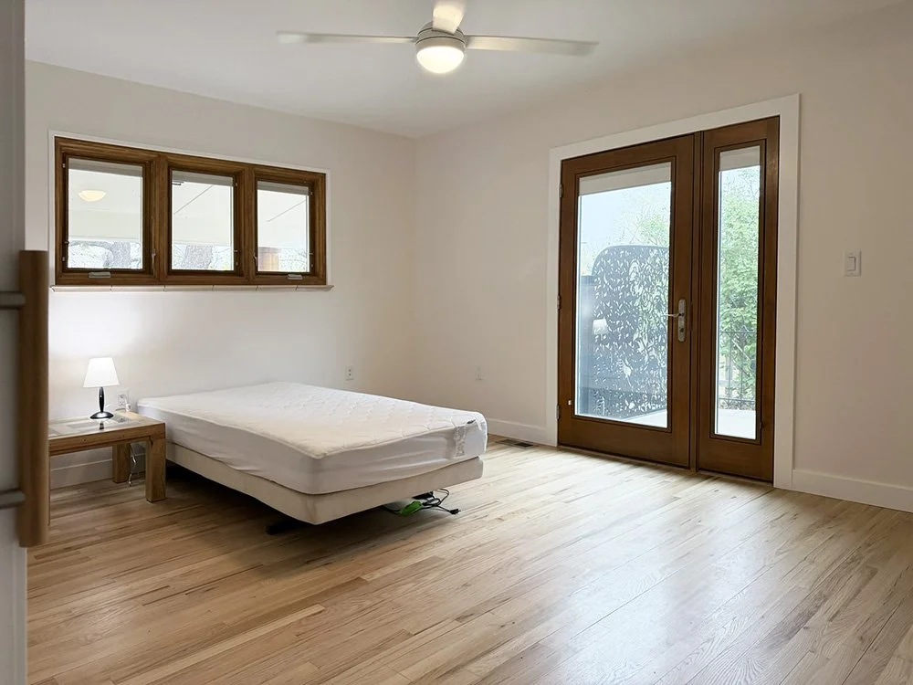 The second bedroom entrance is from the hall. There's an accessible exterior door to the east porch. There is a pneumatic medical bed available for use with the house. 