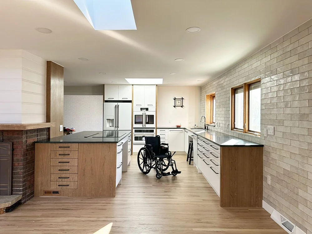 The space between the counters in the kitchen is wide enough for a wheelchair to turn.