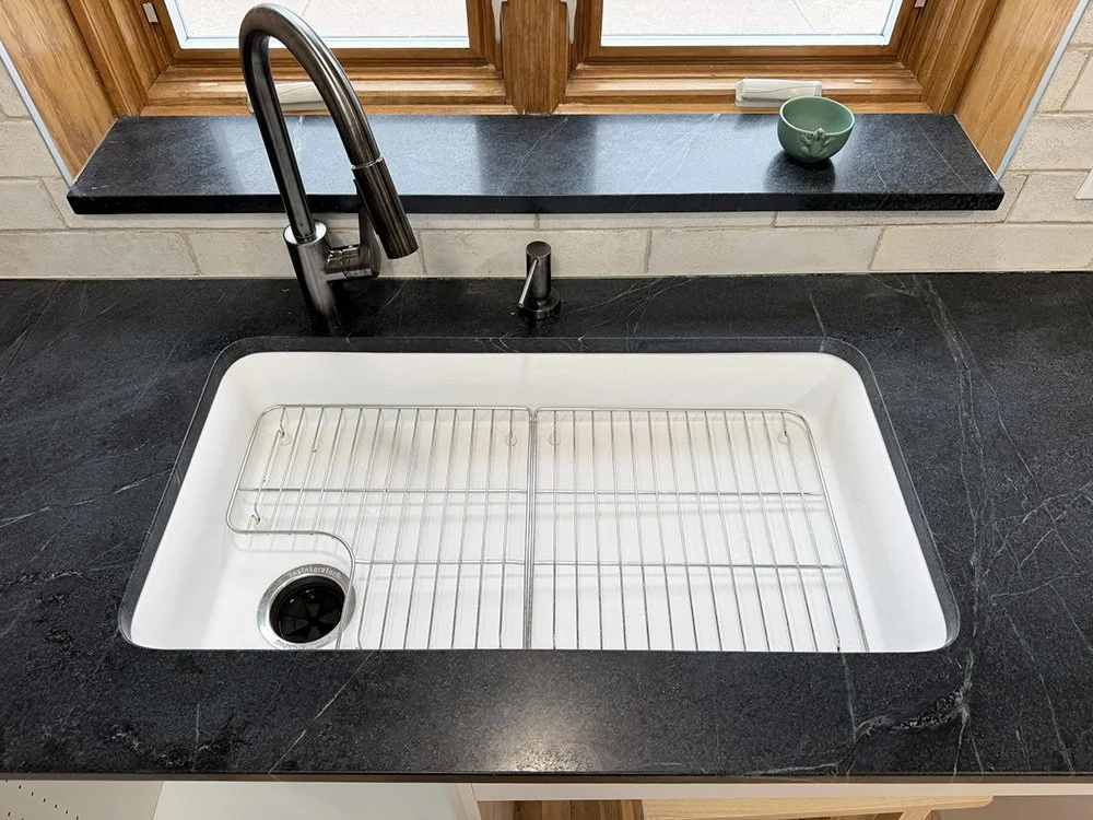 A shallow sink allows room to tuck legs beneath the sink.