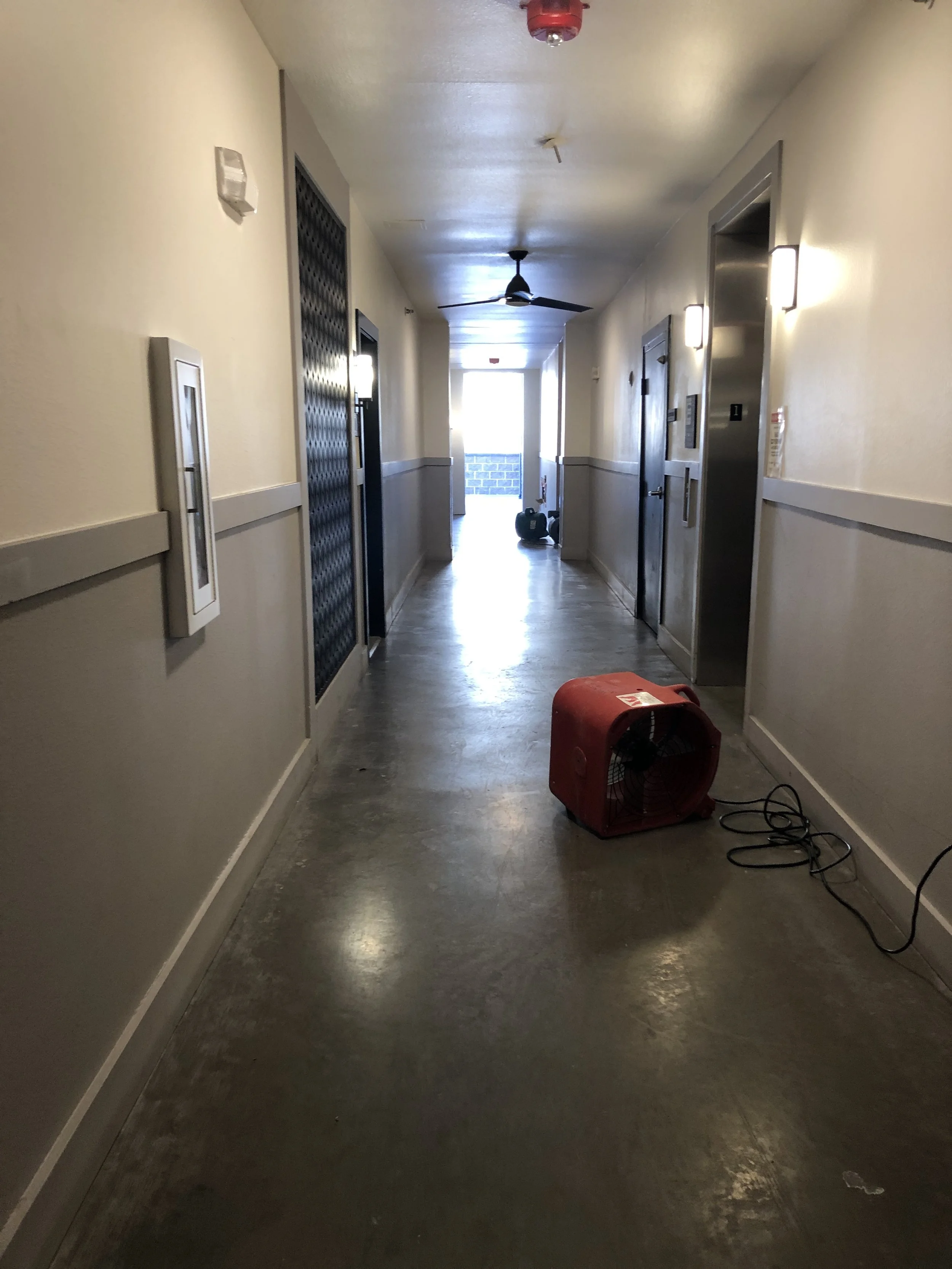 Water can sometimes migrate through structural materials to reach other materials that are dry.  