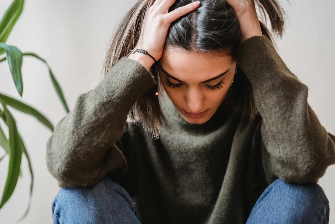 Person experiencing anxiety, worry and overthinking