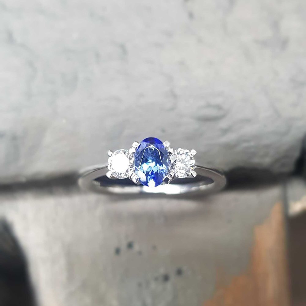We can't get enough of our Oval Blue Sapphire &amp; Diamond Ring!

White diamonds nestled either side of a striking oval cornflower blue sapphire, handmade in platinum by our master jeweller in our Smithbrook Kilns workshop in the heart of the Surrey