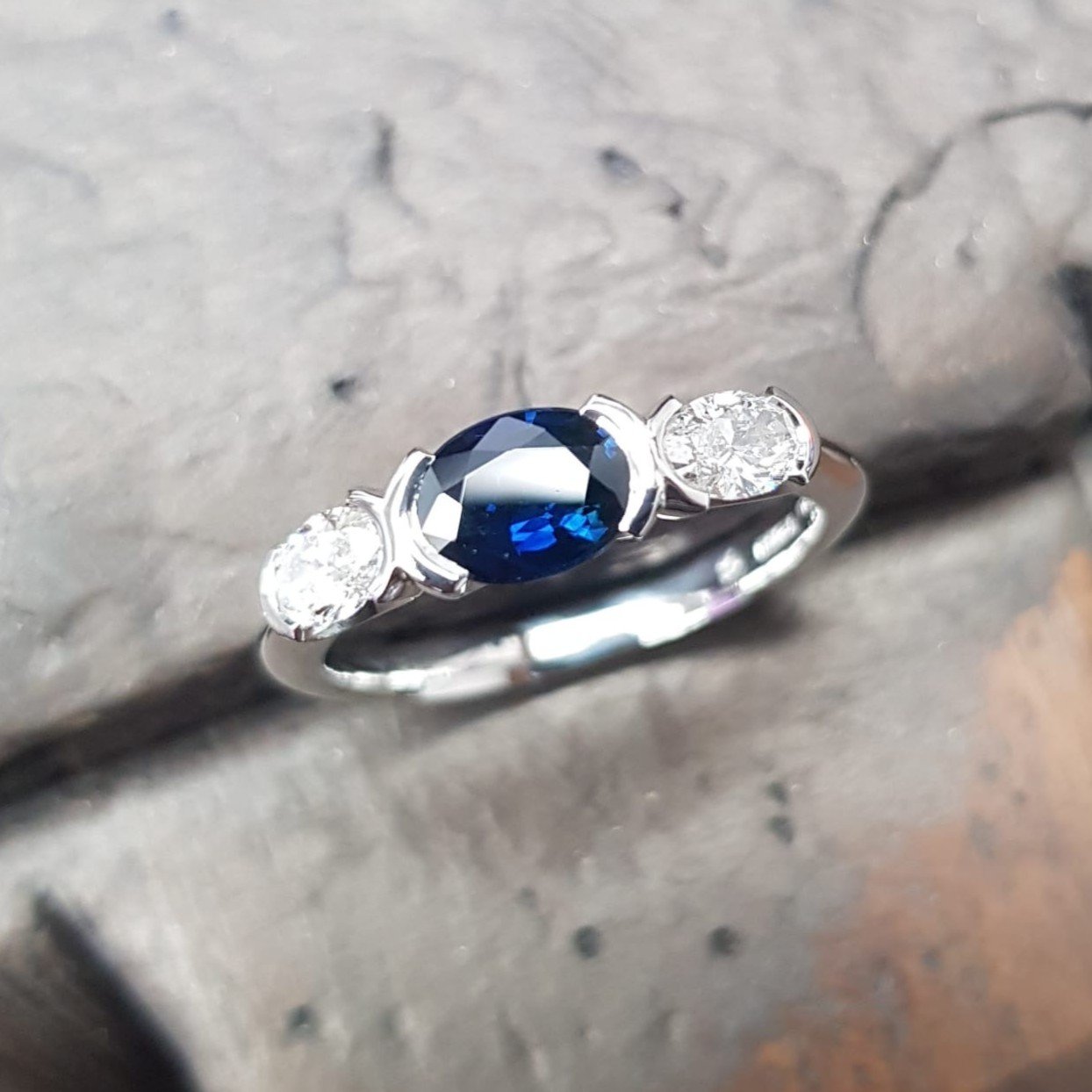 What a delight to work with our lovely customer and her stunning oval blue sapphire to create this glorious ring. Matching the oval diamonds can be a bit of a task sometimes - ensuring we get the exact size and depth to complement each other.  This o