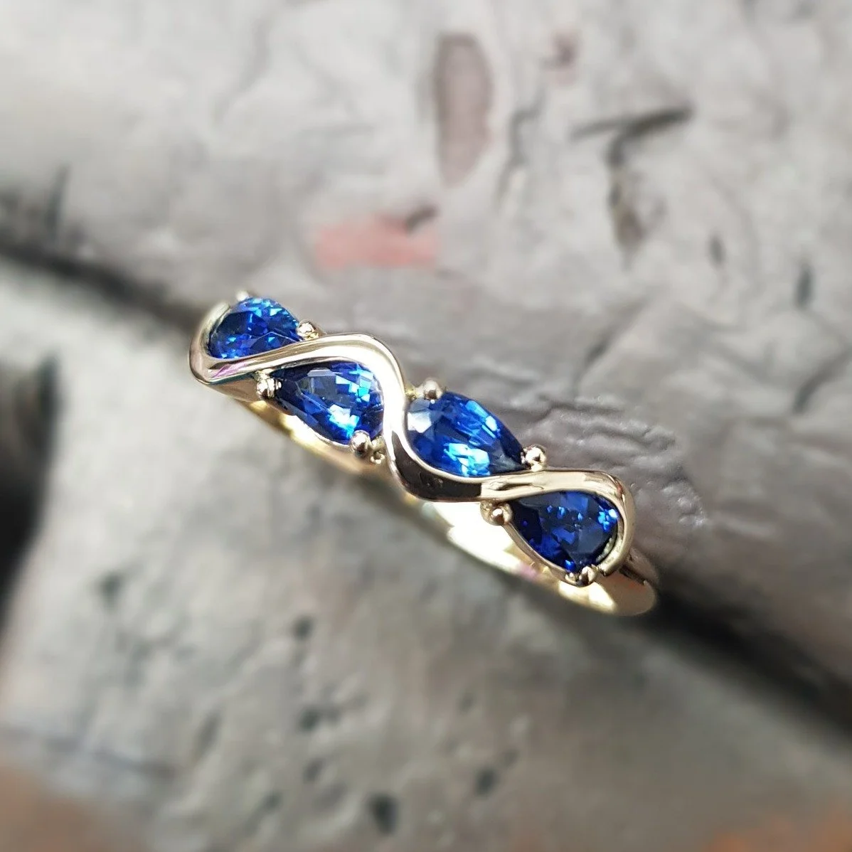 Our lovely customer picked up this bespoke piece yesterday - a customised version of our Rivoletto ring, set with four carefully matched pear cut blue sapphires. 

If you're looking for something just that little bit different, pop in and have a chat