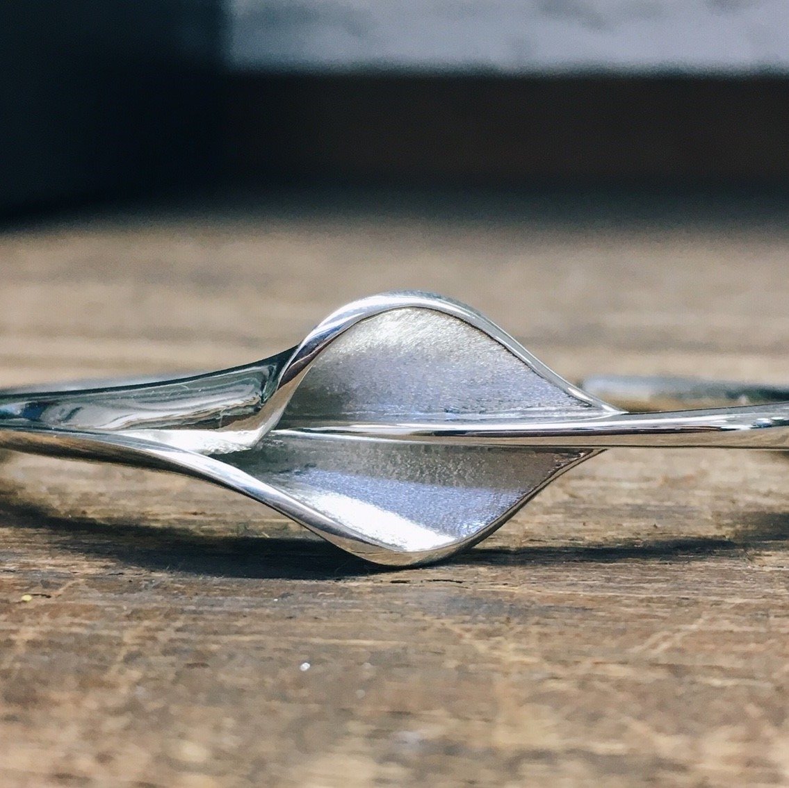 Lilly is one of our Signature designs, created more than 30 years ago, but still totally timeless.  It's a carefully conceived combination of structural, curved, polished lines and expertly applied textures that make this a simple statement collectio