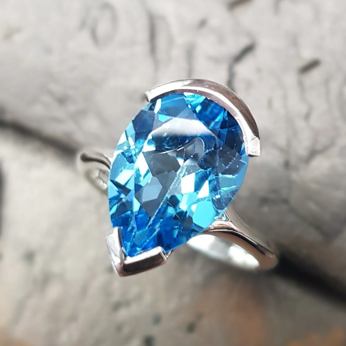 A special elongated version of our Pear Bubble Ring set with a lovely, bright Swiss Blue Topaz - perfect for party season!  We had three stones in this shape which we've used this year, so keep your eyes peeled for two other versions coming very soon