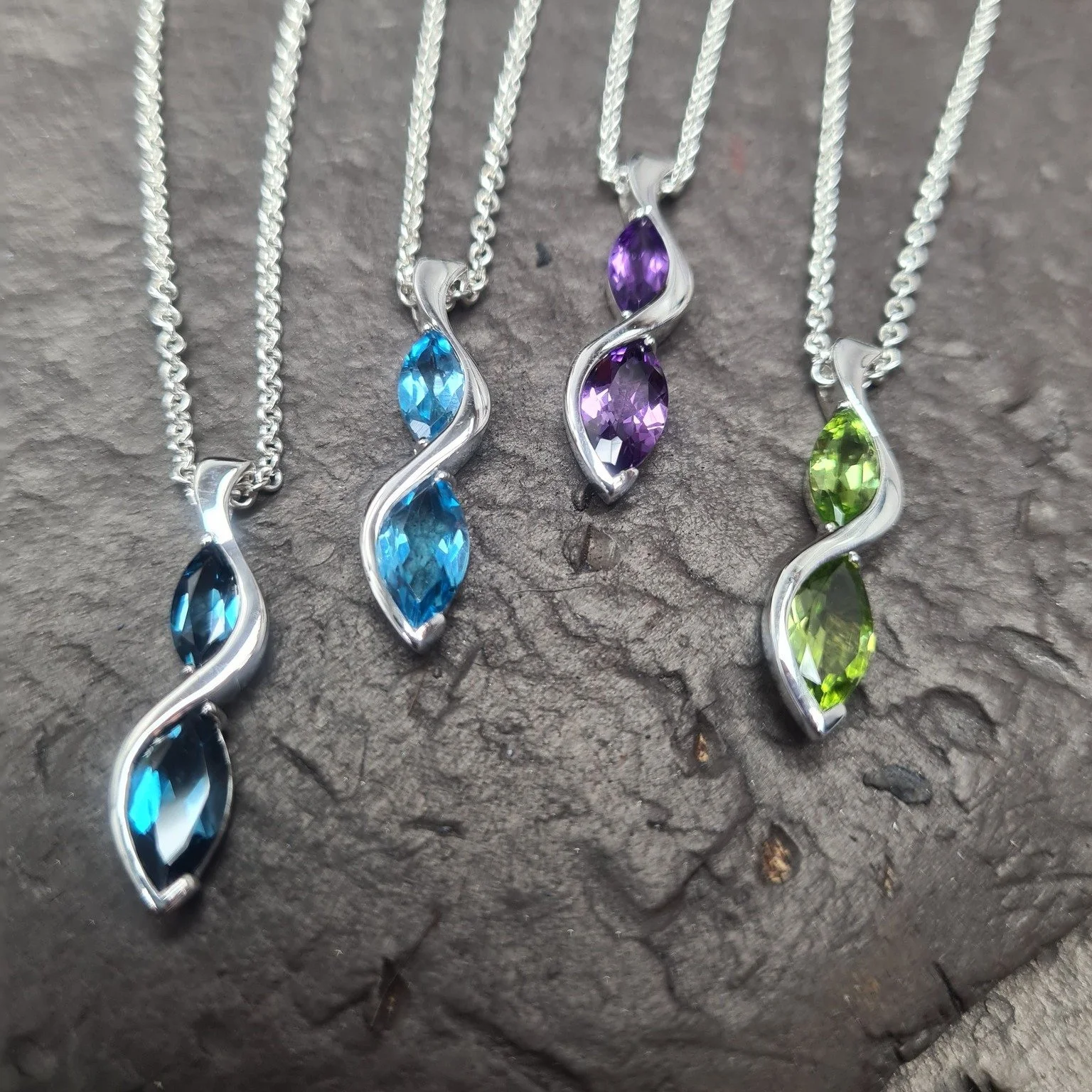 Our two stone Rivoletto pendant perfectly showcases the elegance of the marquise cut stone - we spend hours sorting through stones to ensure we get a matching pair with the same clarity and depth of colour.