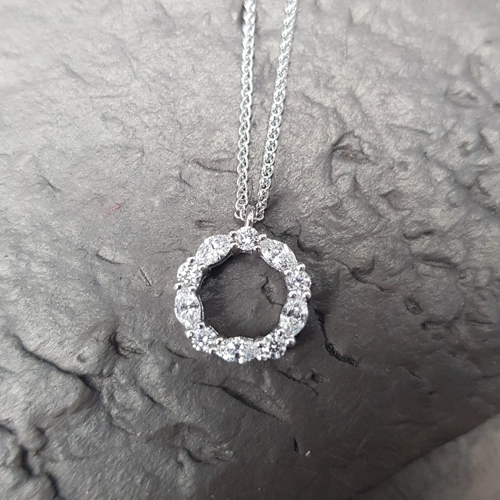Promise. Alternating round and marquise diamonds set in 18ct white gold. A stunning 'forever' piece.