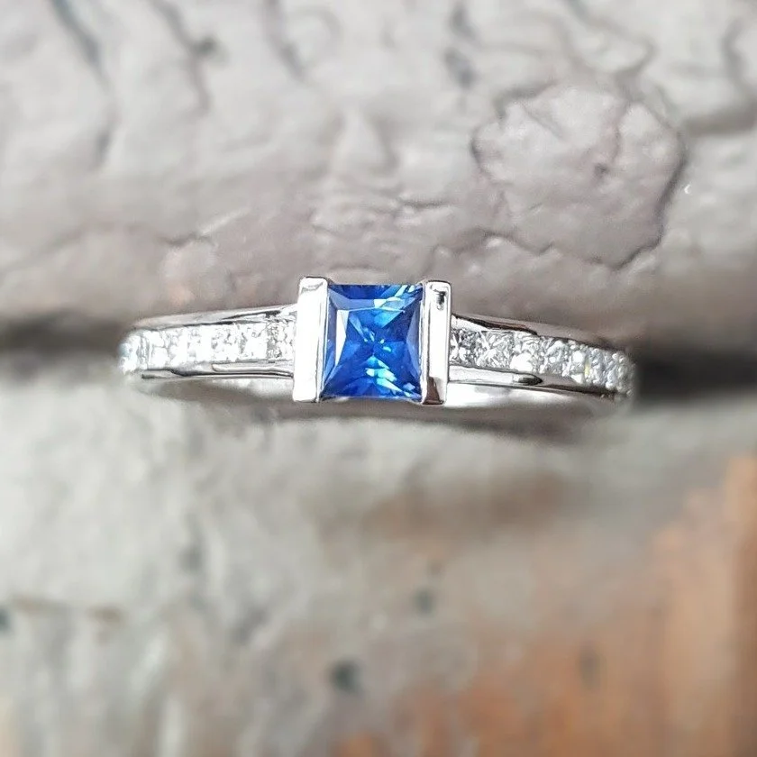 For all you princess cut lovers - we've just done the final polish on this lovely unique ring. A central 0.45cts blue sapphire - set in a platinum band with 20 princess cut diamonds on the shoulders.