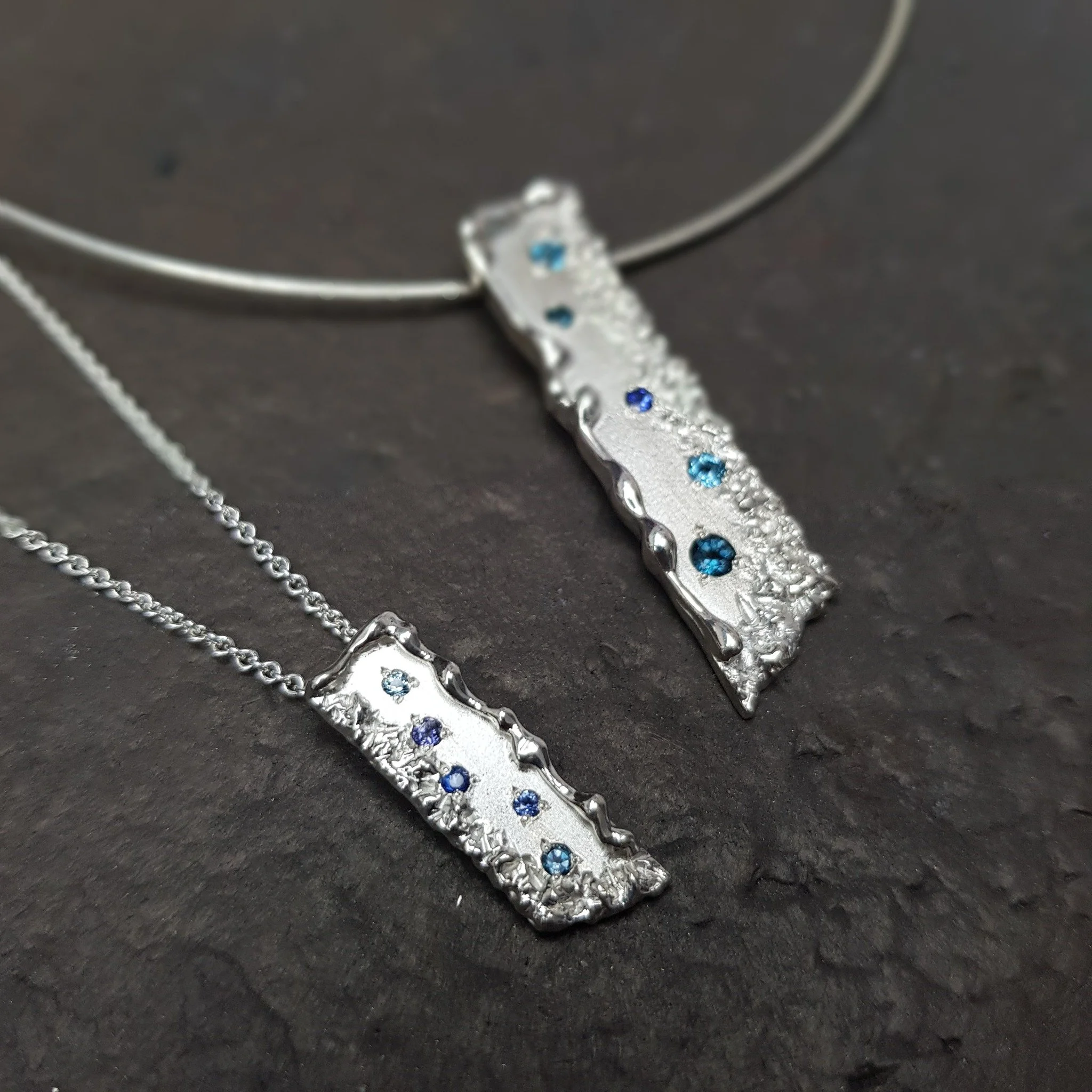 Well hello Mini Crumble!  Another in our mini series - we're really enjoying making these.  Same amazing texture, but bite sized.  This one-off is set with blue topaz, blue sapphire and an iolite.  What do you think?