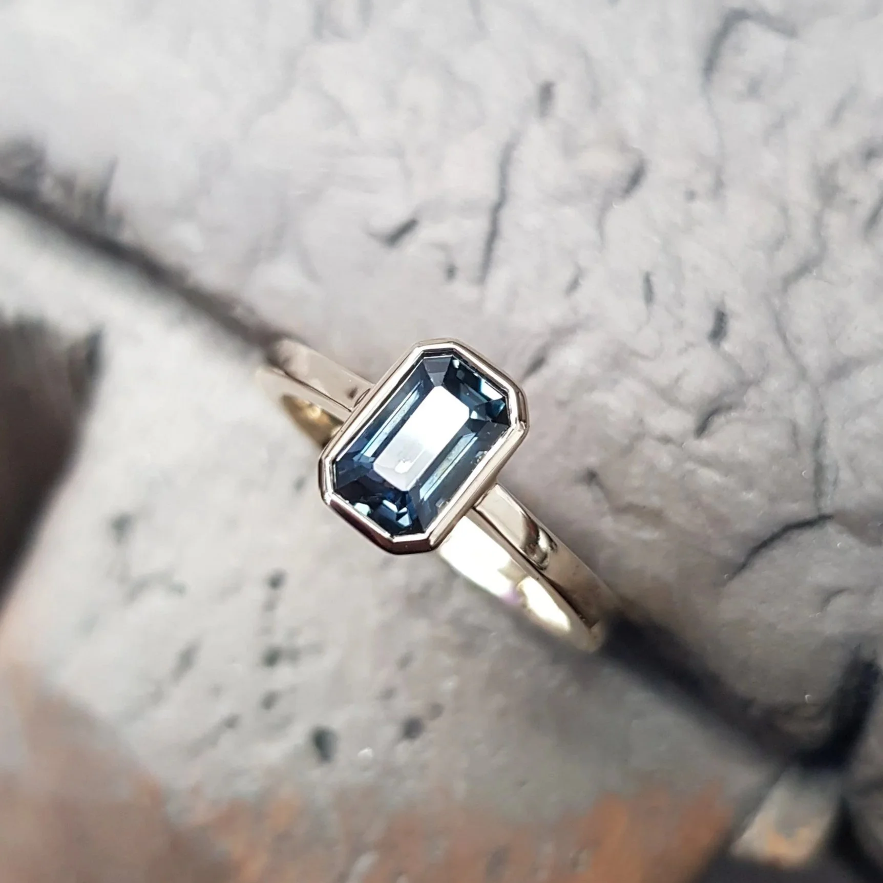 Emerald Cut Teal Sapphire Ring.jpg