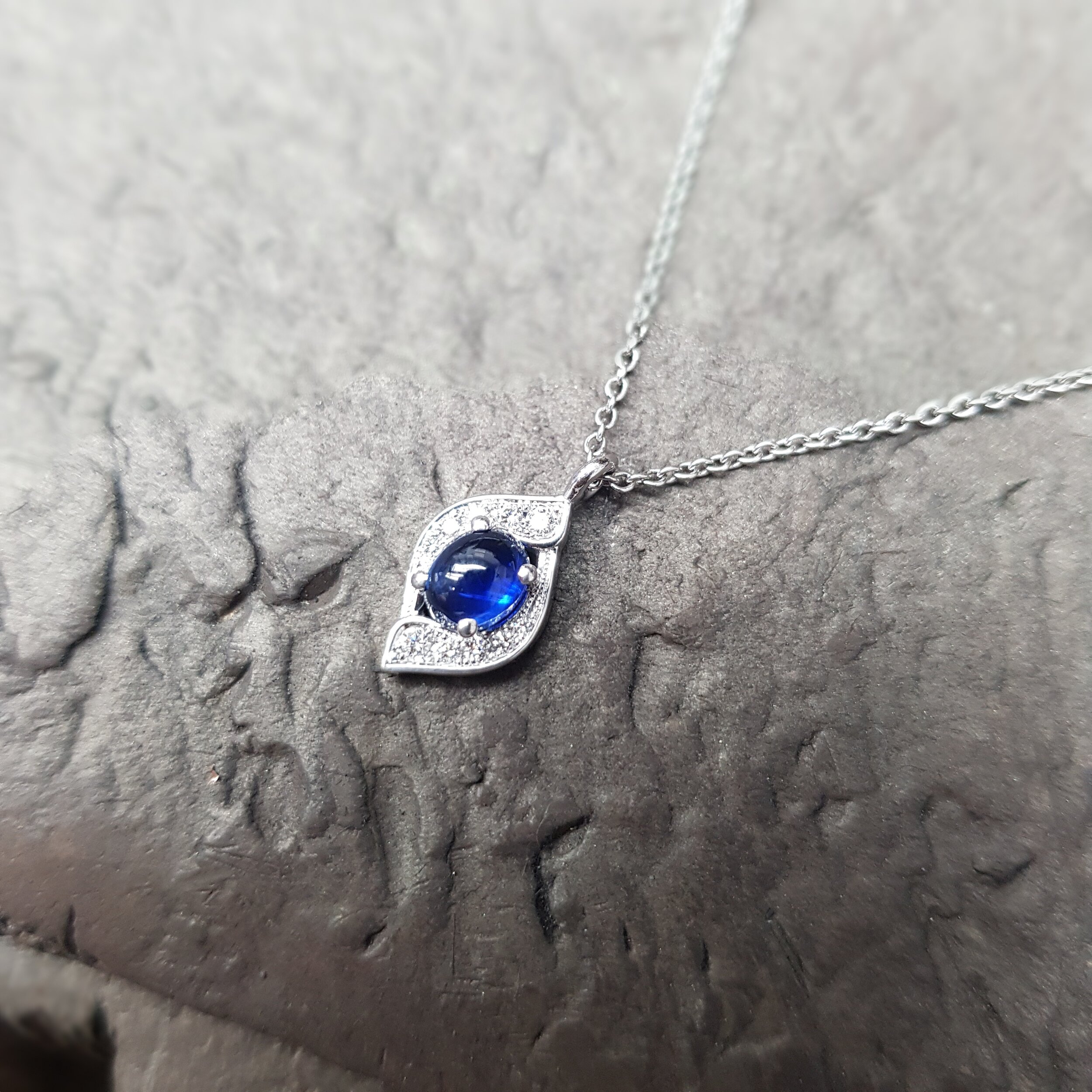 Embrace Pendant Sapphire 2.jpg
