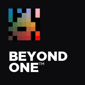 Pixelated abstract image with the text 'BEYOND ONE' in bold white letters on a black background.
