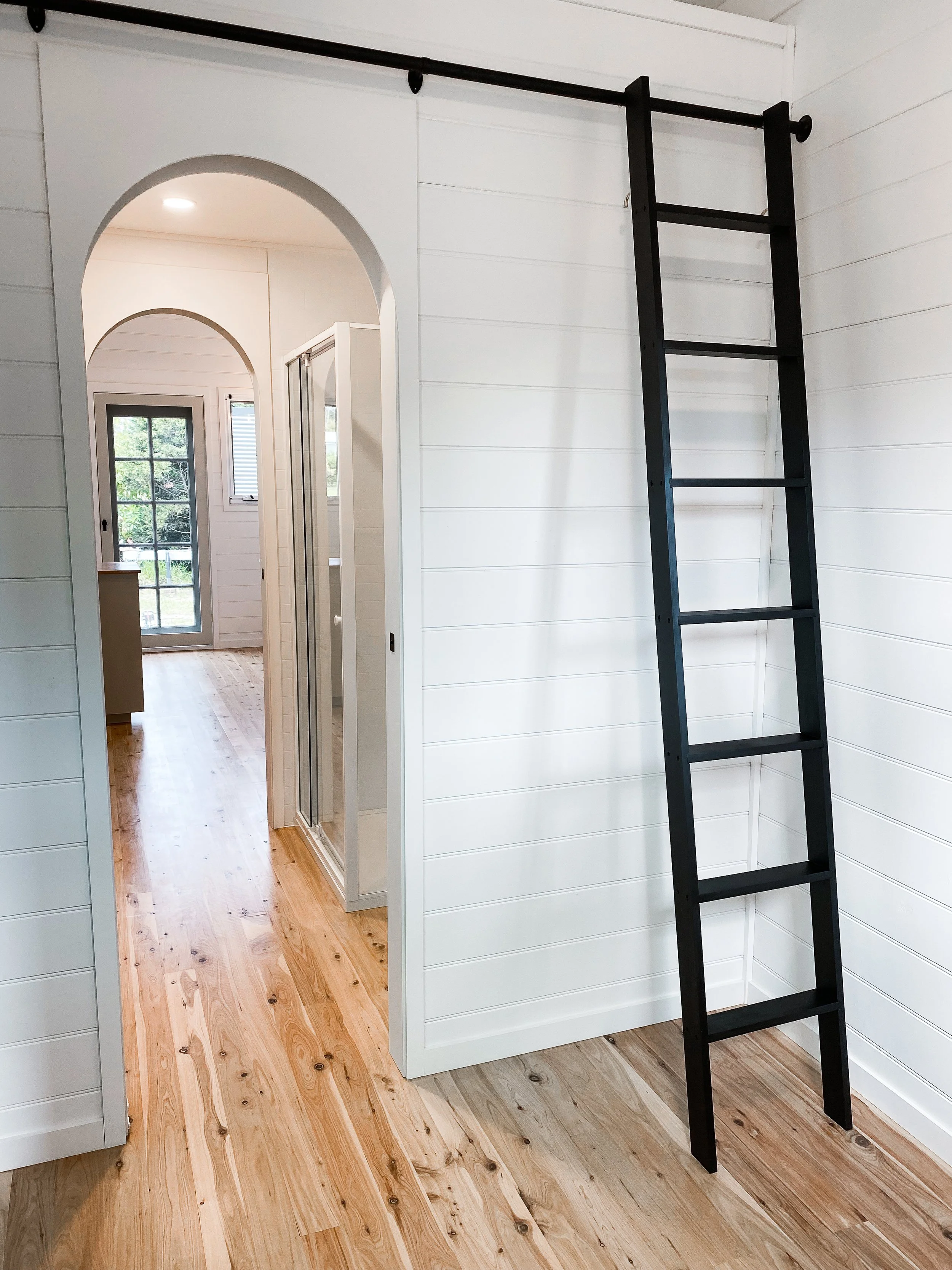 Arch walkway tiny home