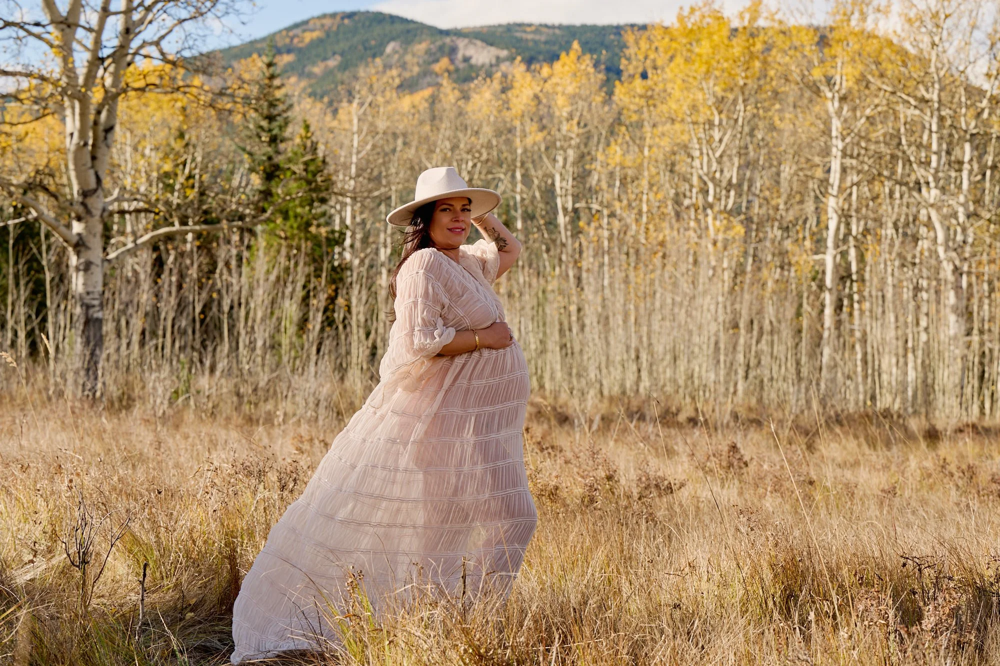 Classic studio portrait from a maternity session in Denver by Ethan Herrold.