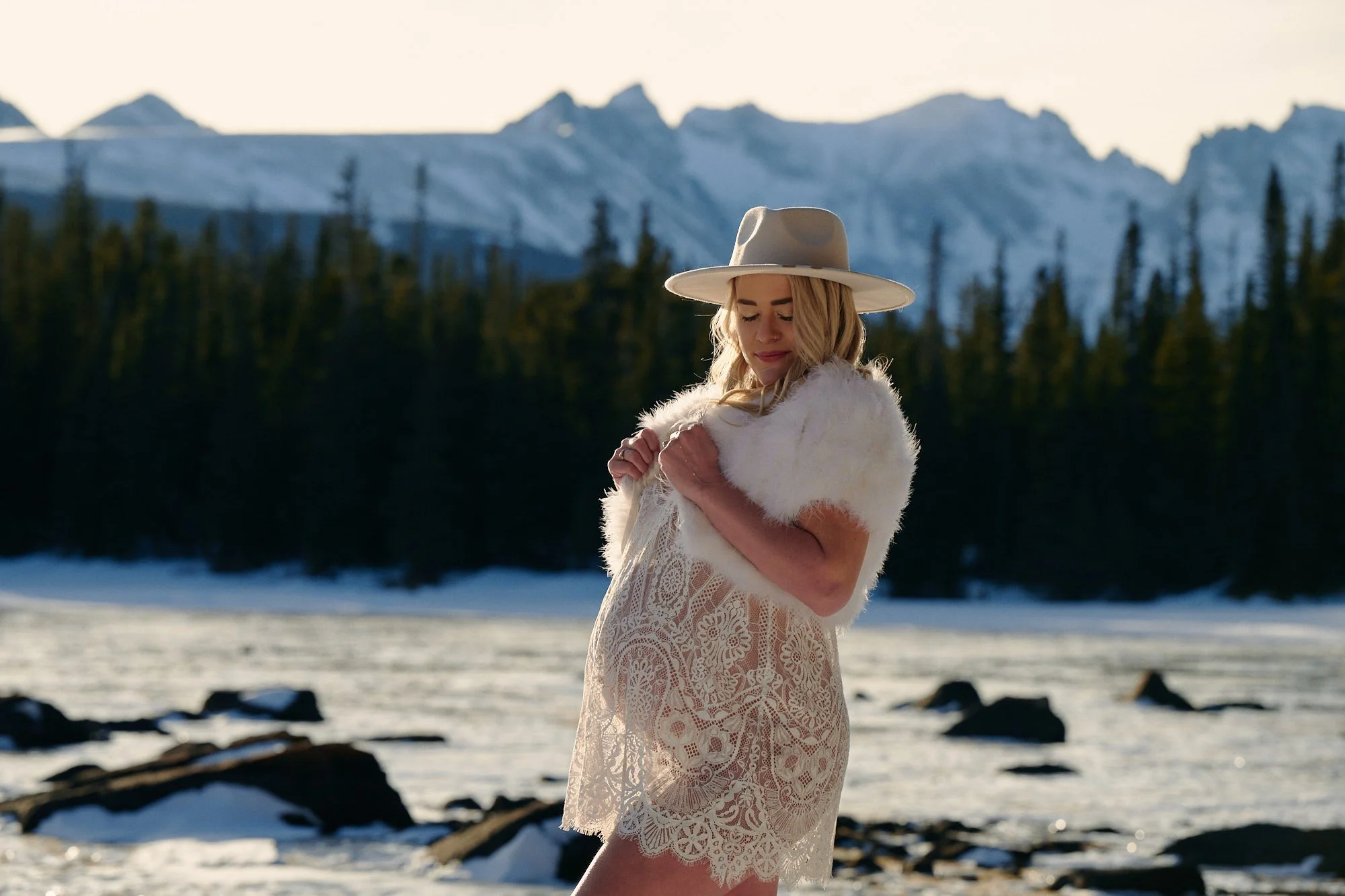 Kaitlin during her snowy winter maternity session in the Colorado mountains.