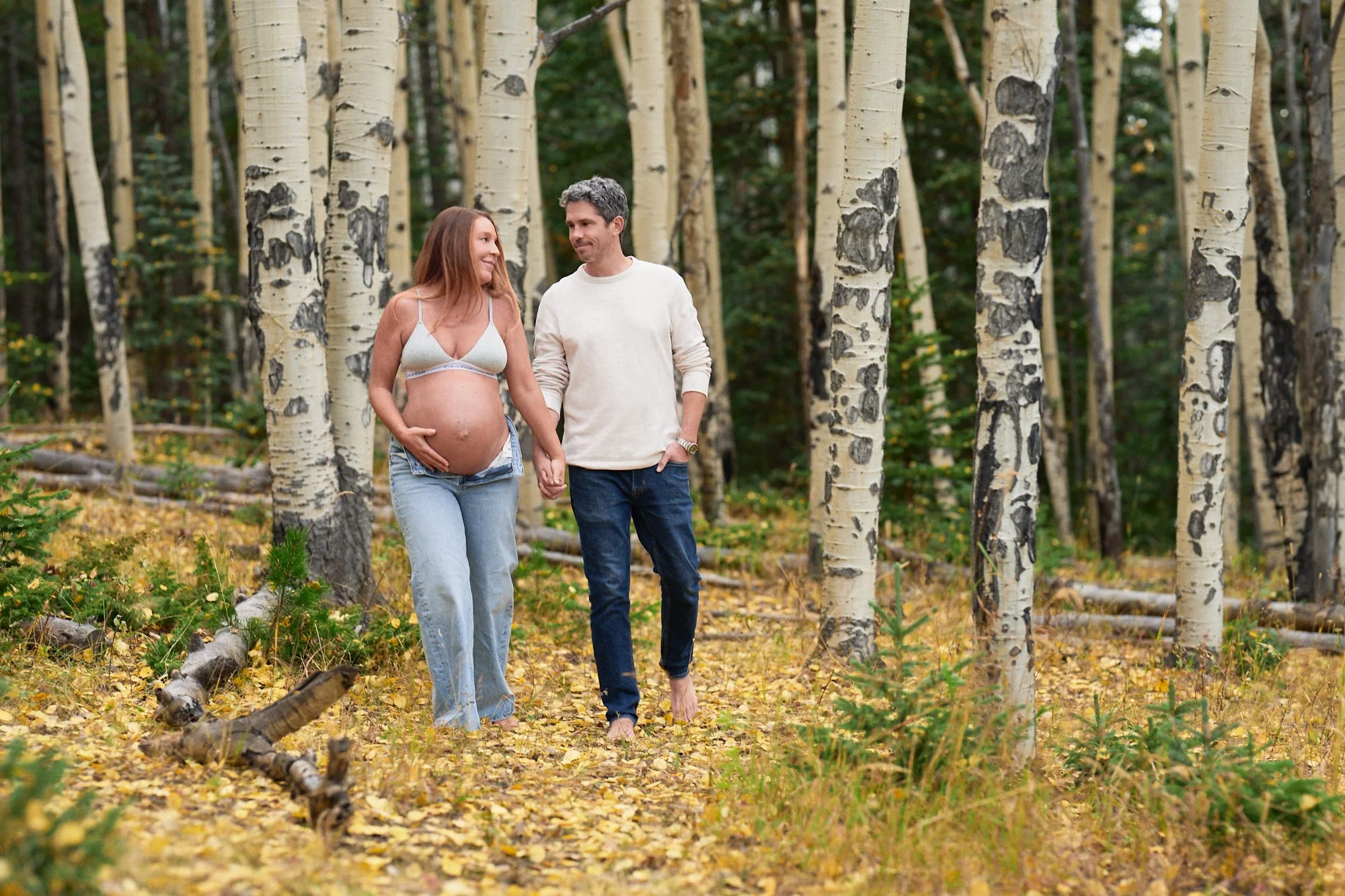 Ashley during her fall maternity session among Colorado autumn colors.