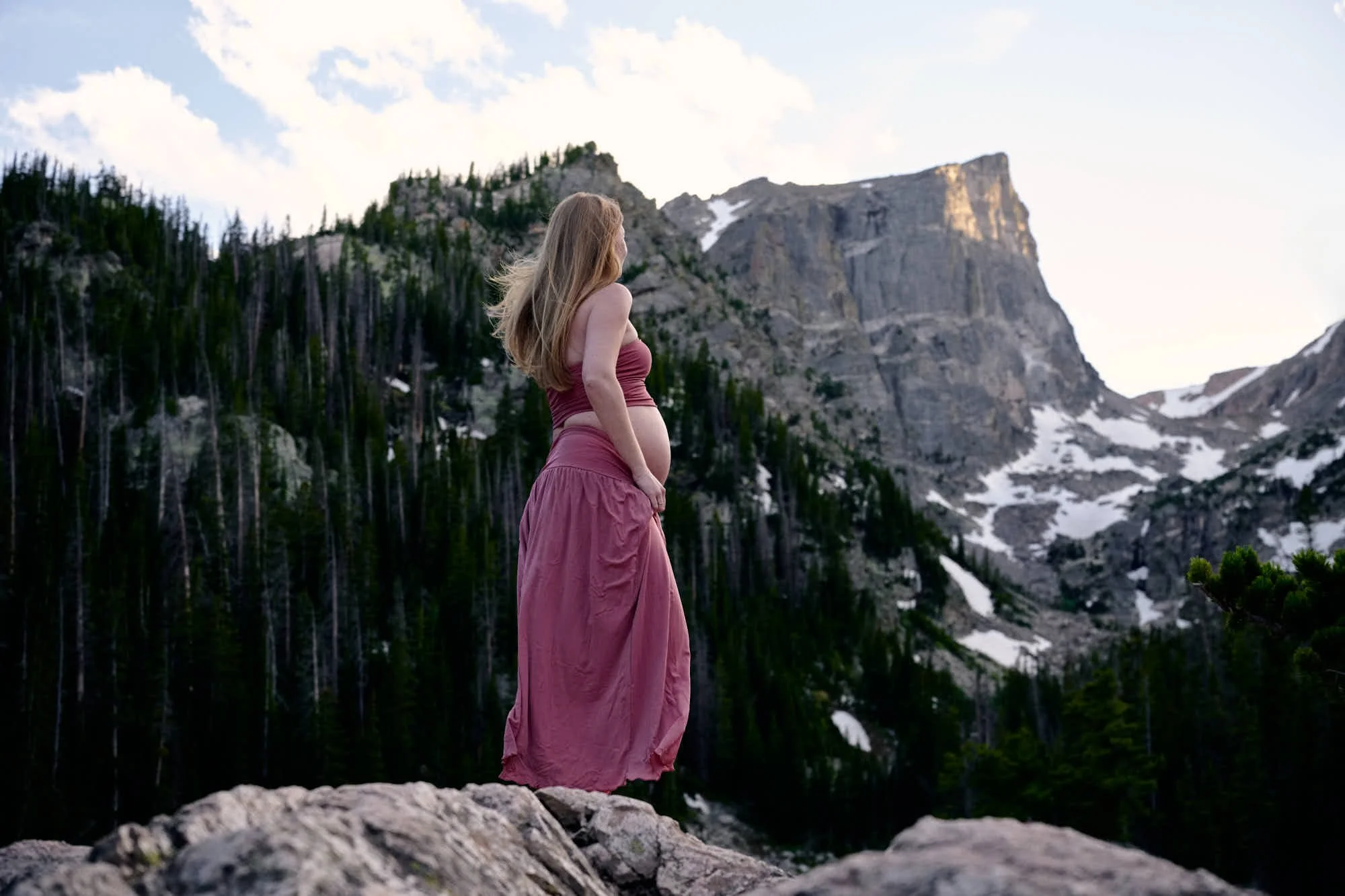 Mountain maternity session in Rocky Mountain National Park near Dream lake.