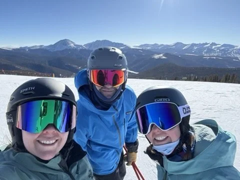Ski-goggle selfie on a snowy Colorado summit.