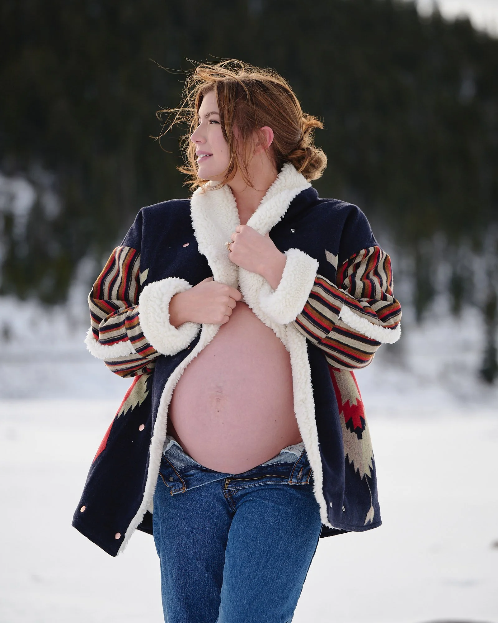 Stacie during her alpine lake maternity session in Colorado.