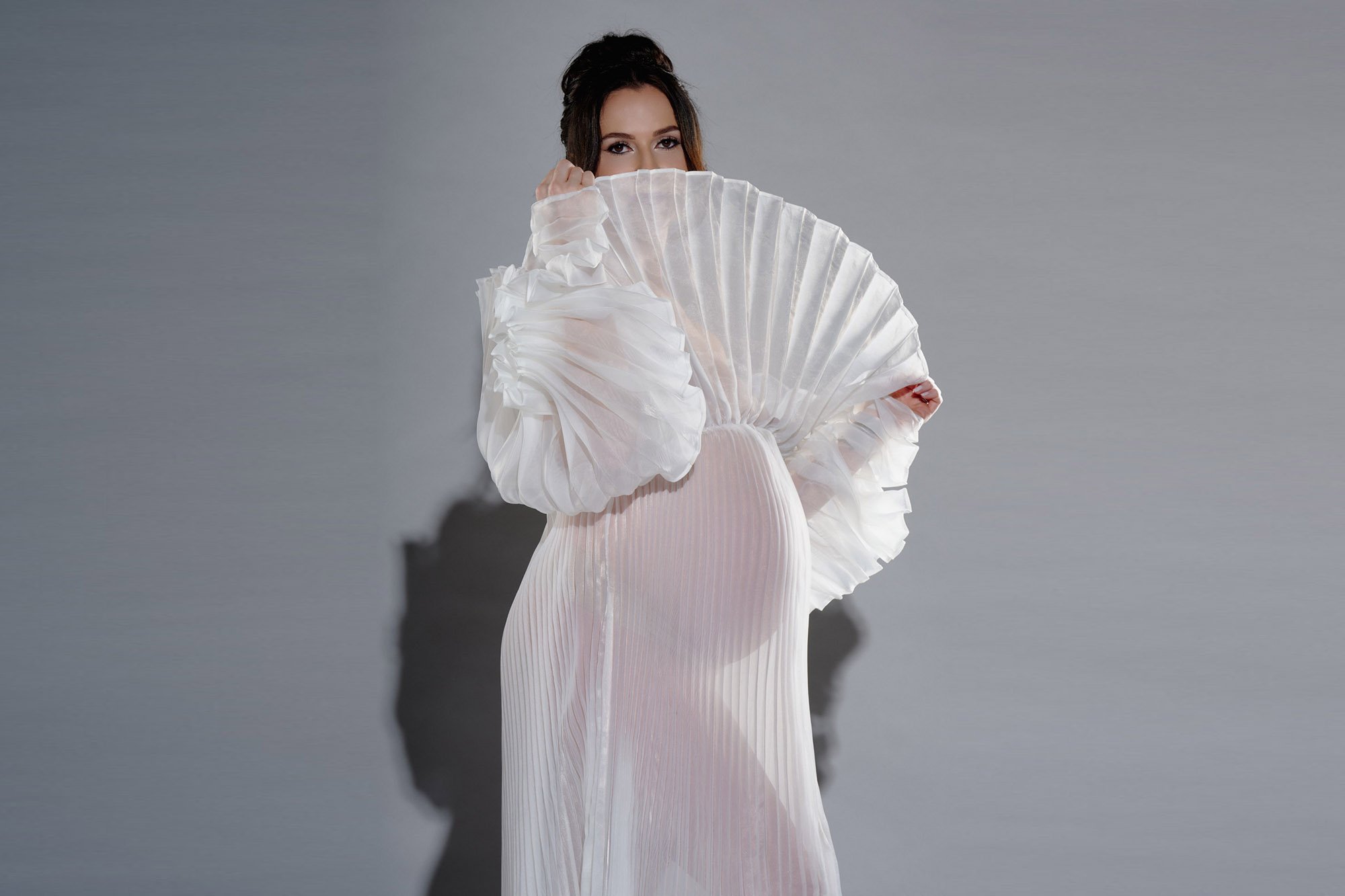 Styled gown from the studio client closet, one answer to what to wear for maternity photos.