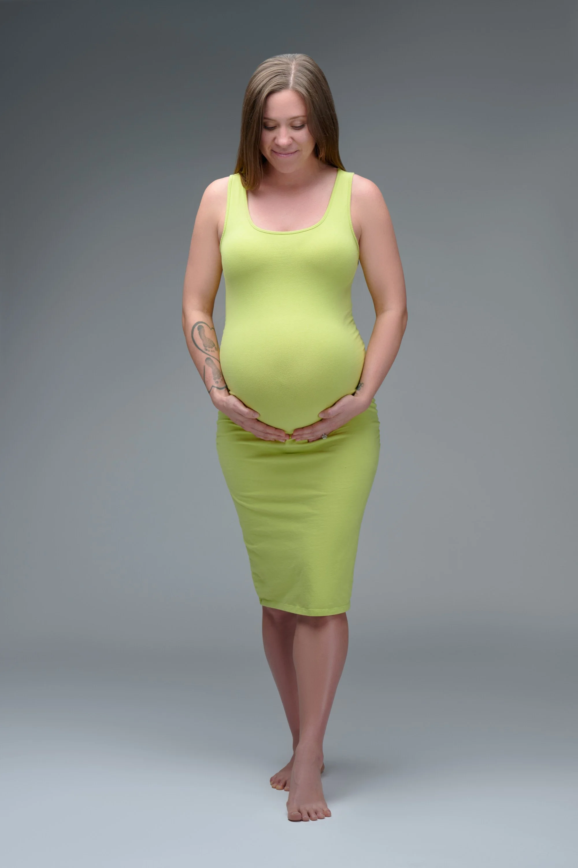 Maternity photo wardrobe styles modeled during a session with Ethan Herrold.