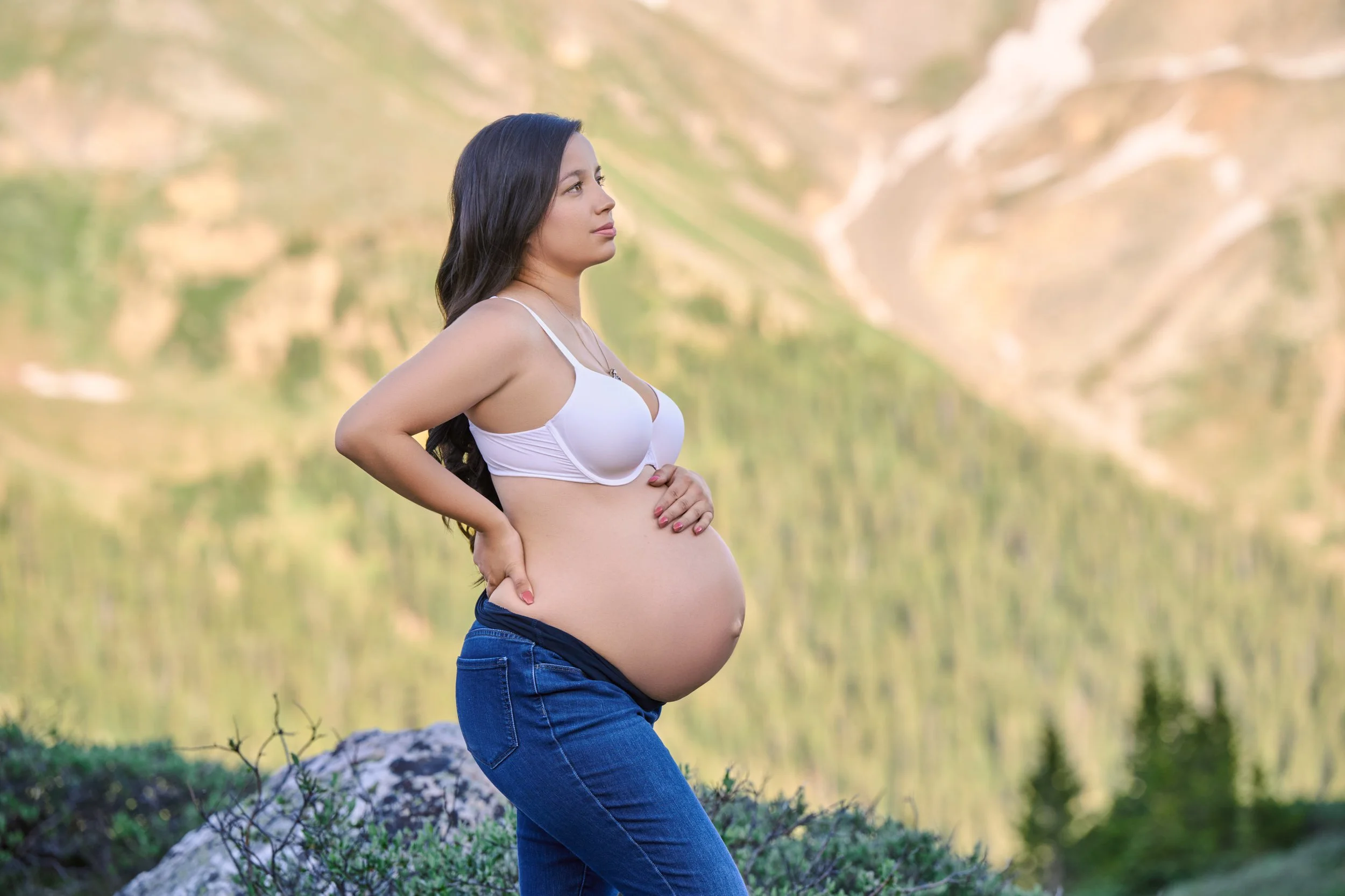 Tirzah at Loveland Pass during her mountain maternity session in Colorado.