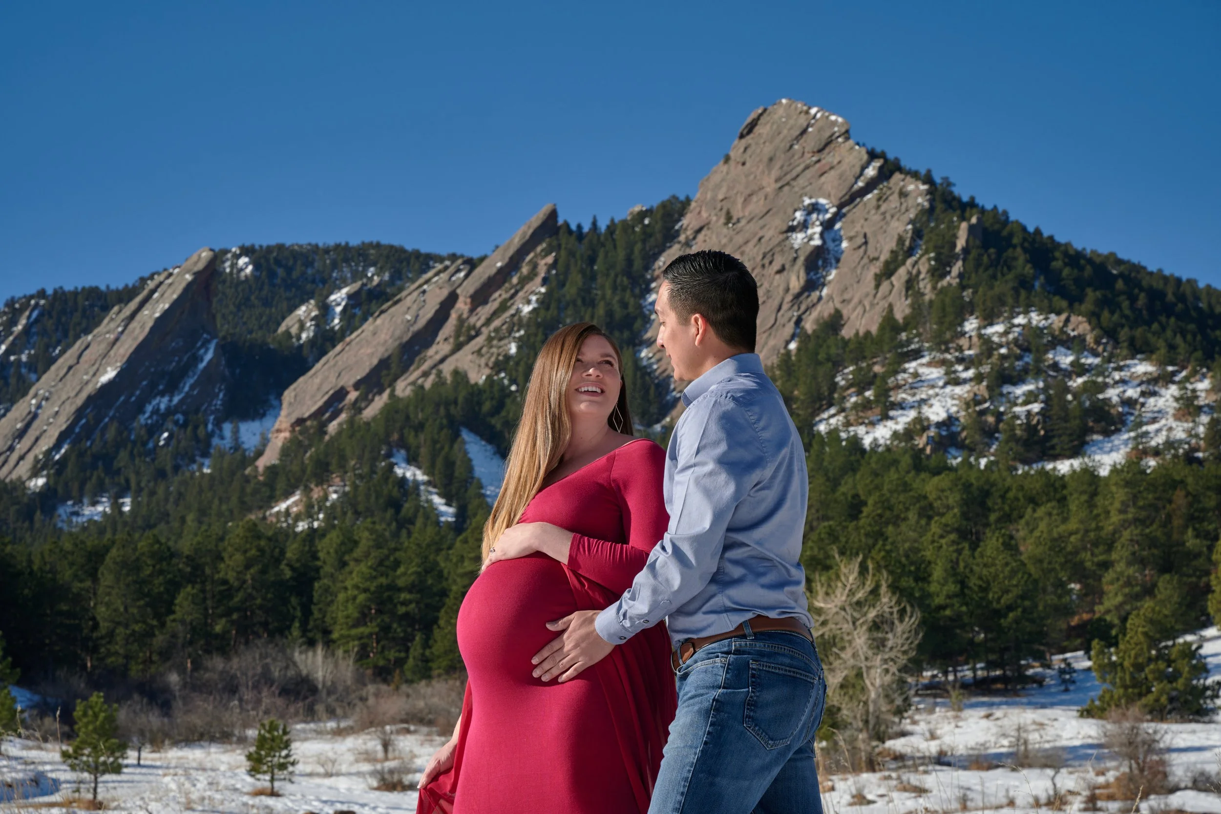 Maternity portrait at Chautauqua Park beneath the Flatirons in Boulder.