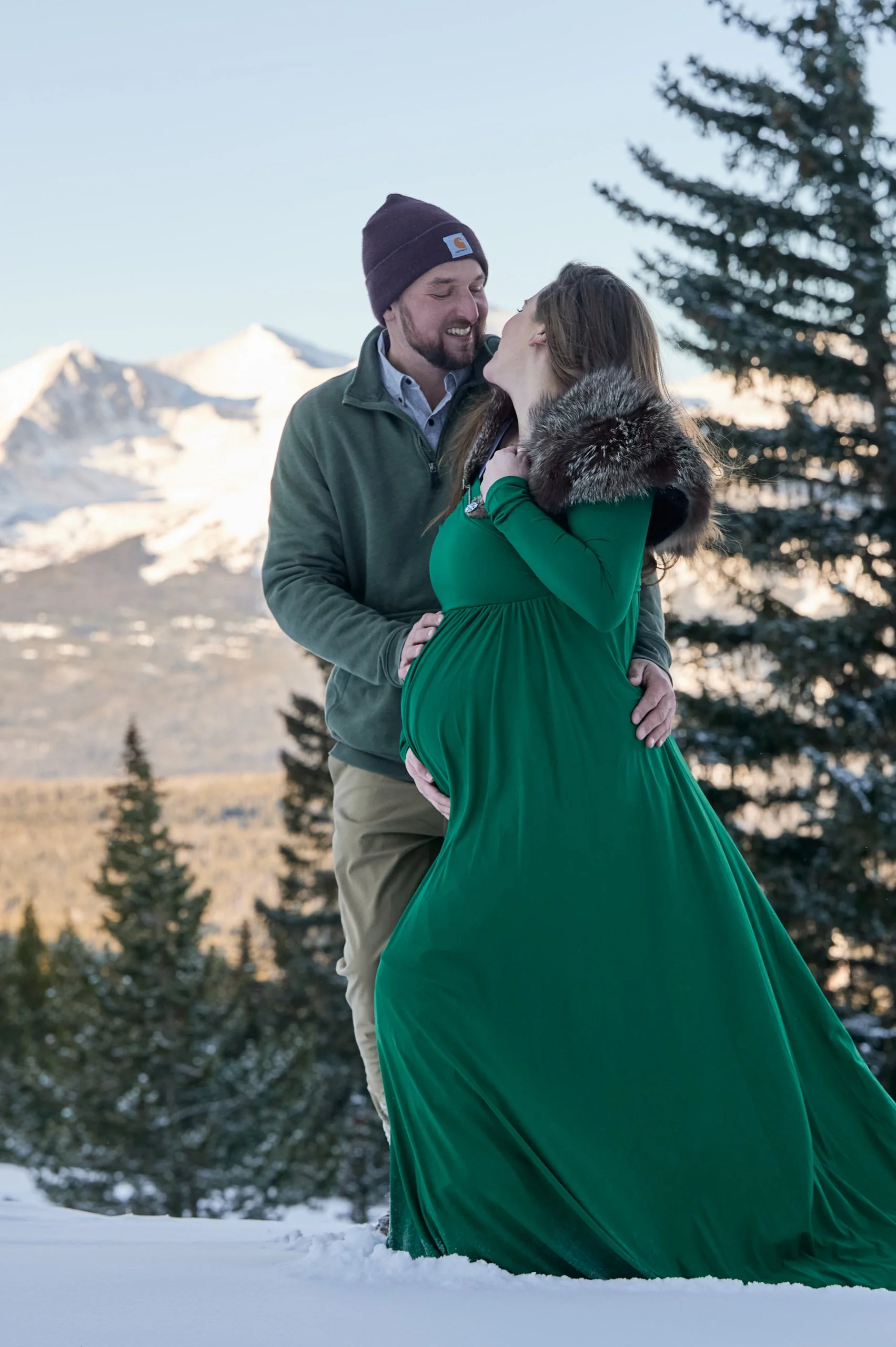 Emerald gown with a sweeping train, a kiss in the snowy pines of the high country.