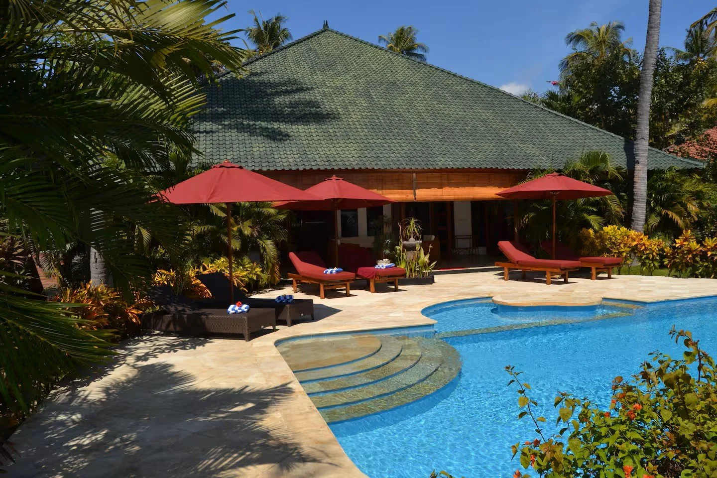 An oceanfront pool and gate at a villa in Lovina on Bali's north coast