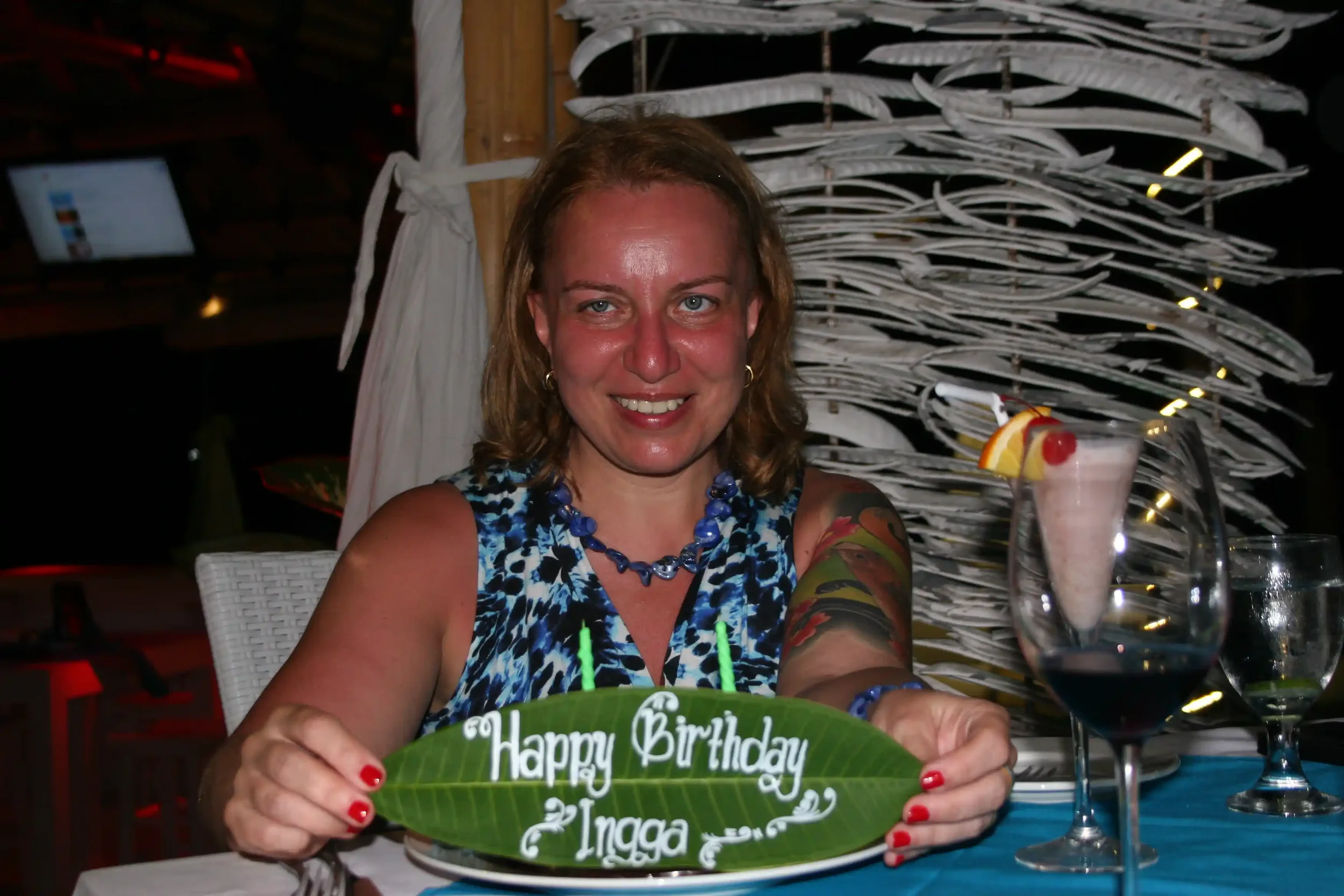 A Happy Birthday message written on a banana leaf at a restaurant in Lovina, Bali
