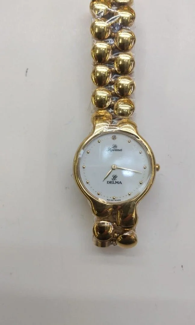 Delma gold watch sales