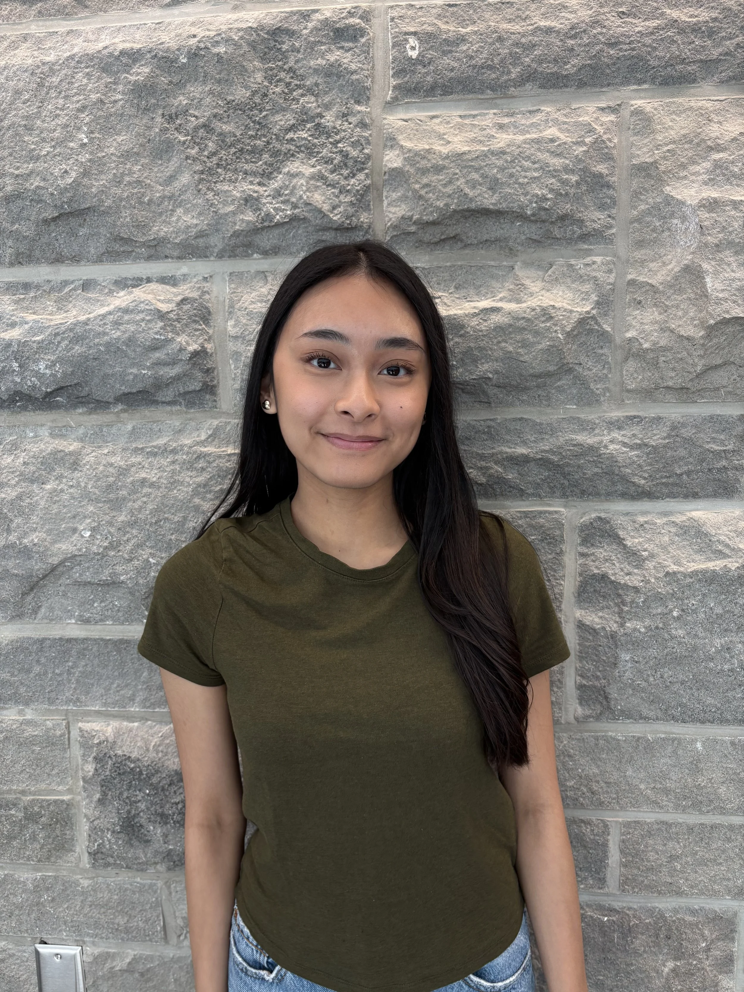 headshot of a smiling woman