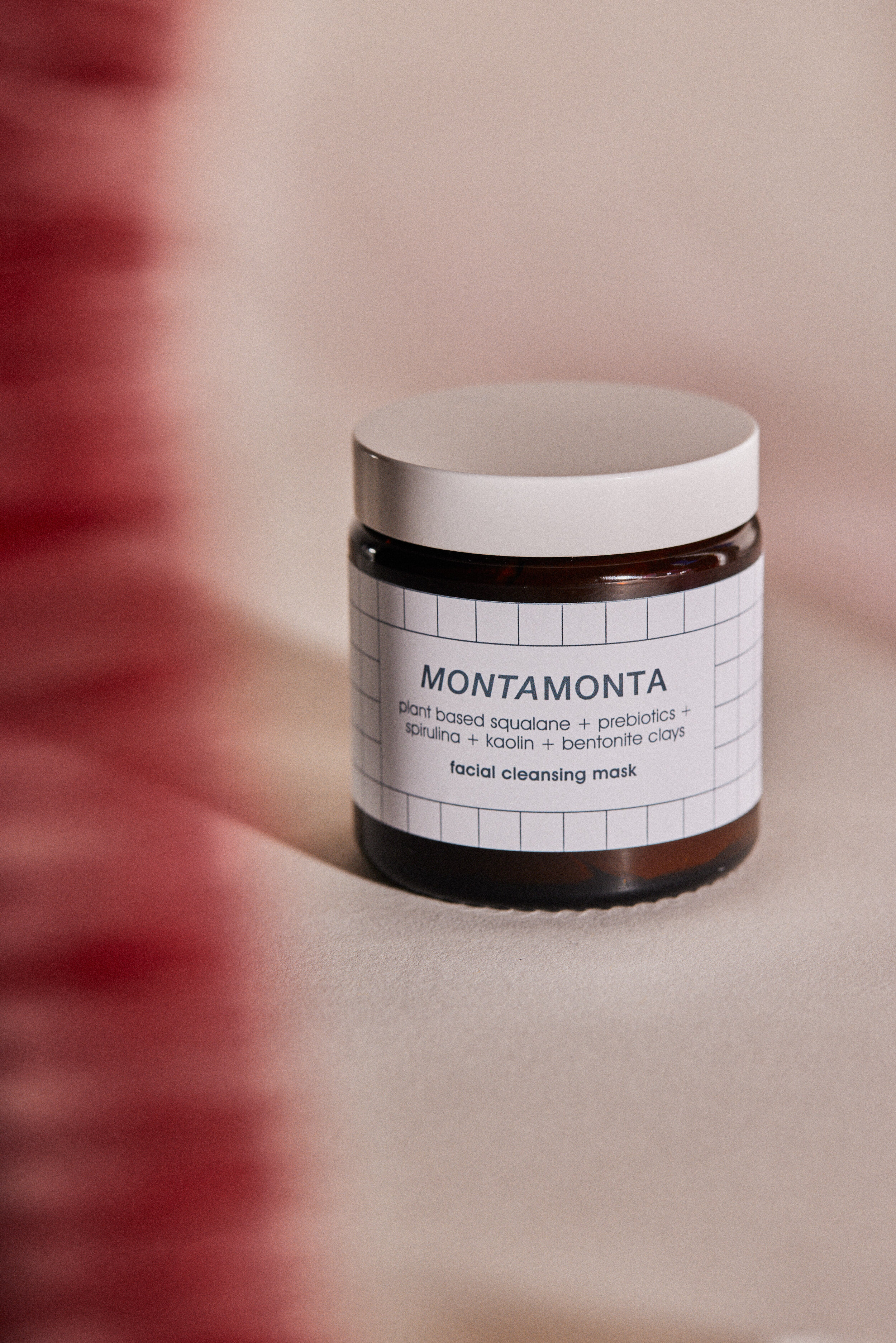glass jar of probiotic clay mask