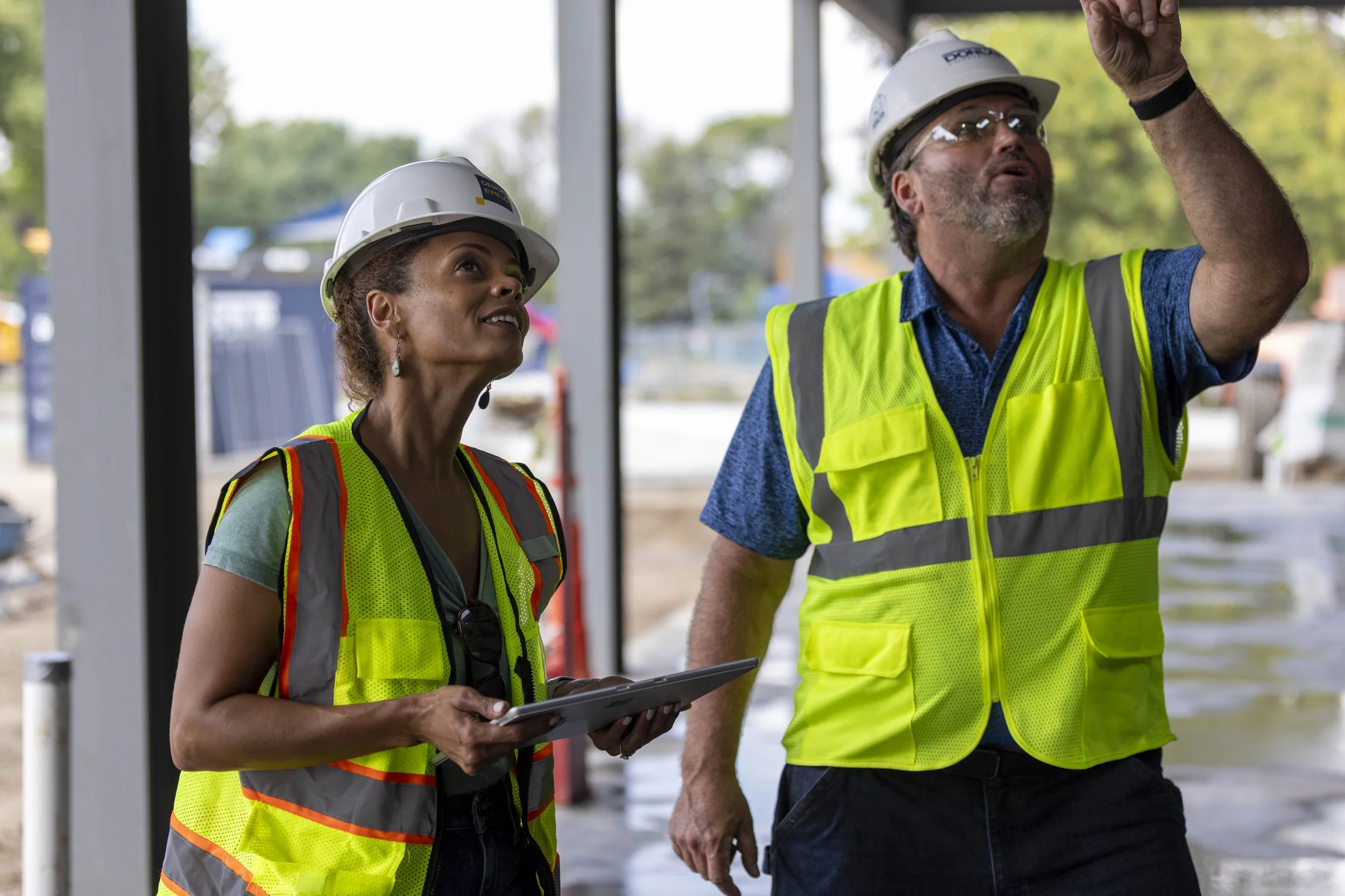 Male and female construction workers