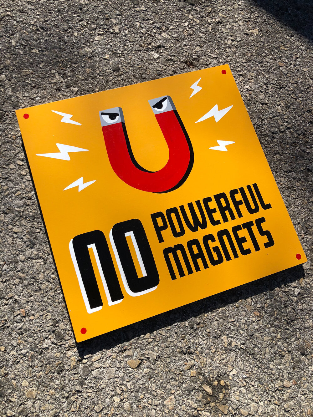 handpainted sign "no powerful magnets'
