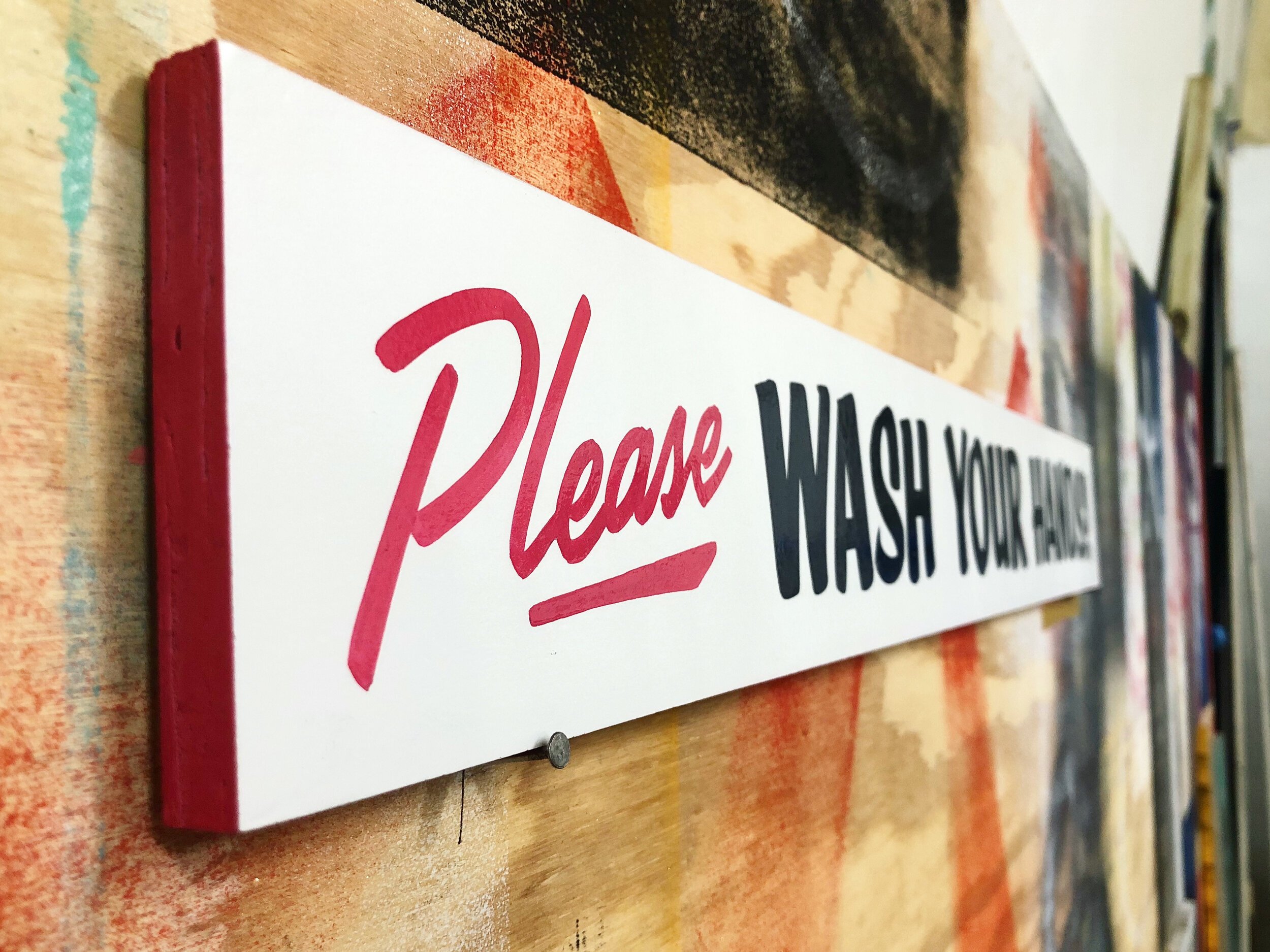 Handpainted "please wash your hands" sign