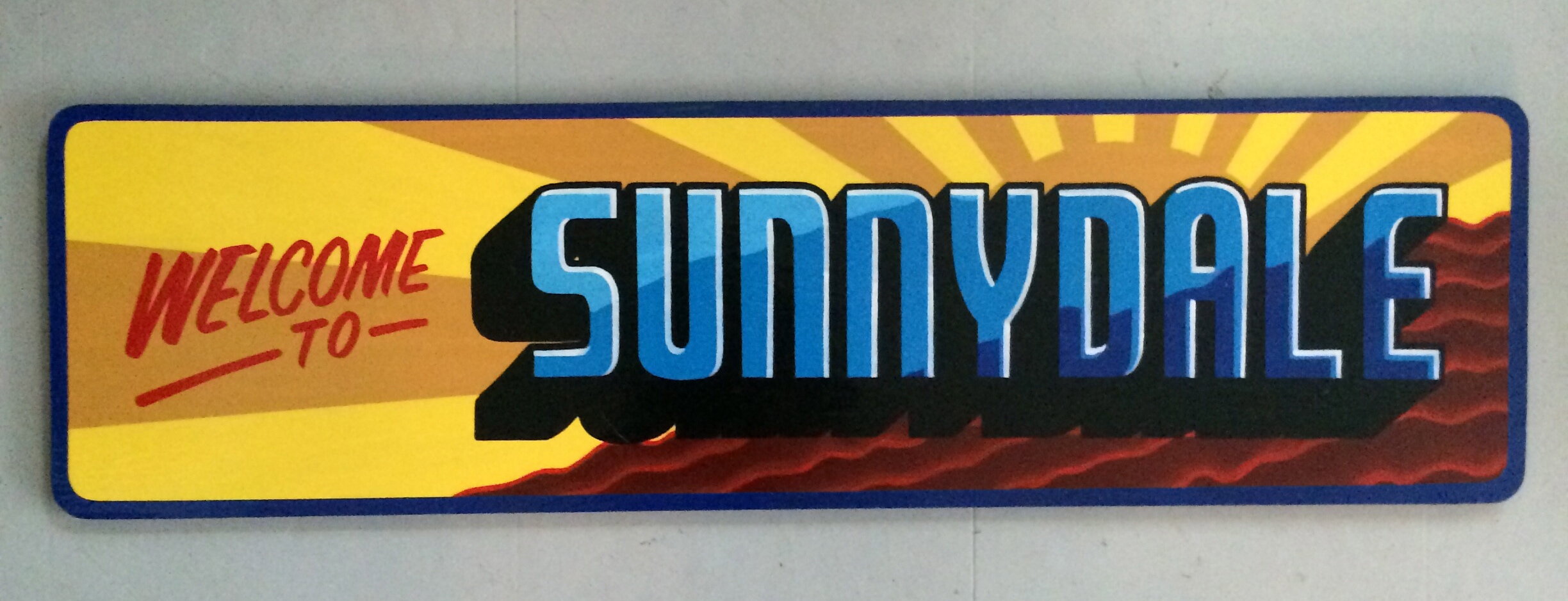 "welcome to sunnyvale" inside mural - logo - business signage - texas by artist andrew manning