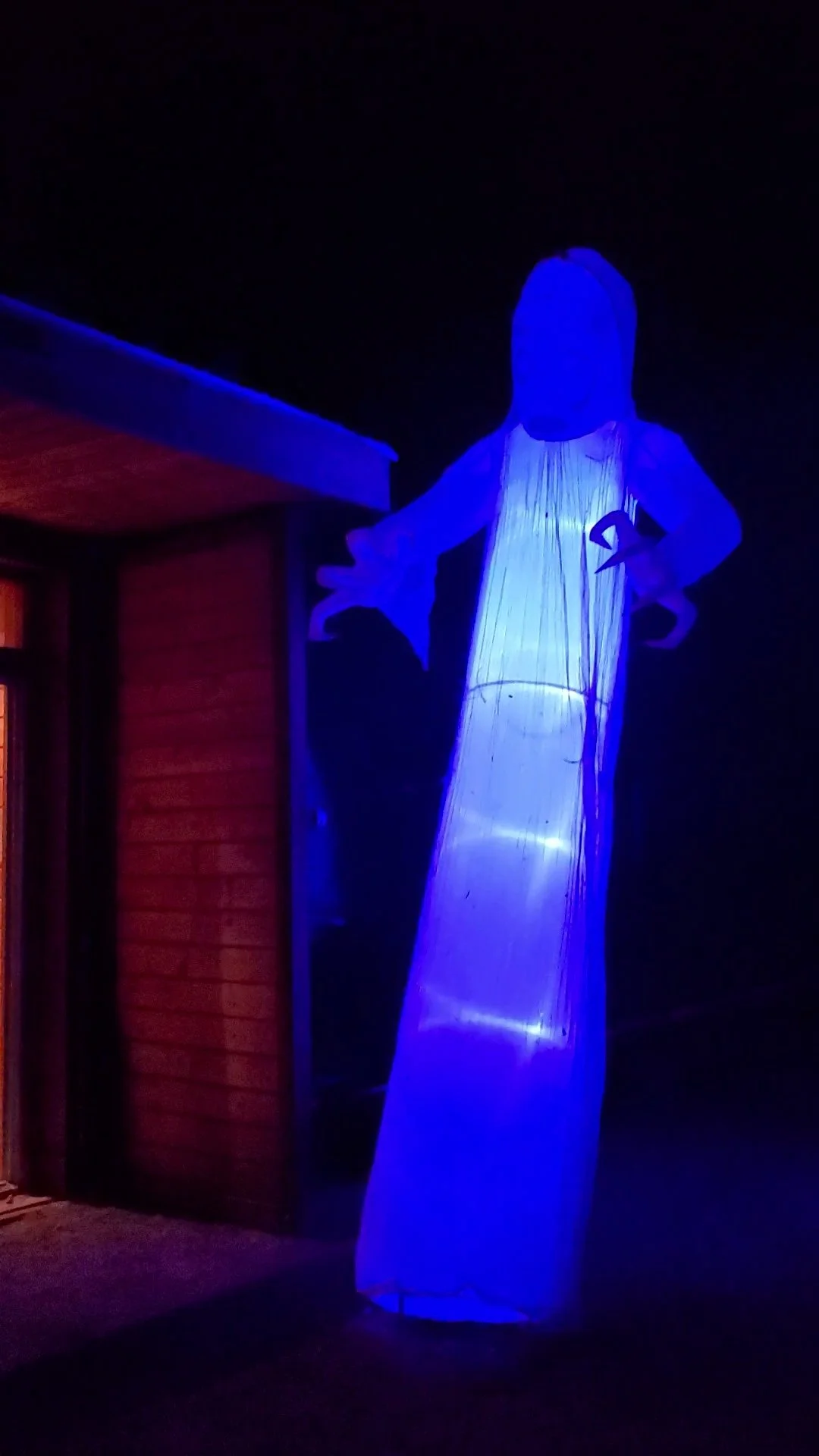 Glowing skeleton and ghost at a past Scare Park event