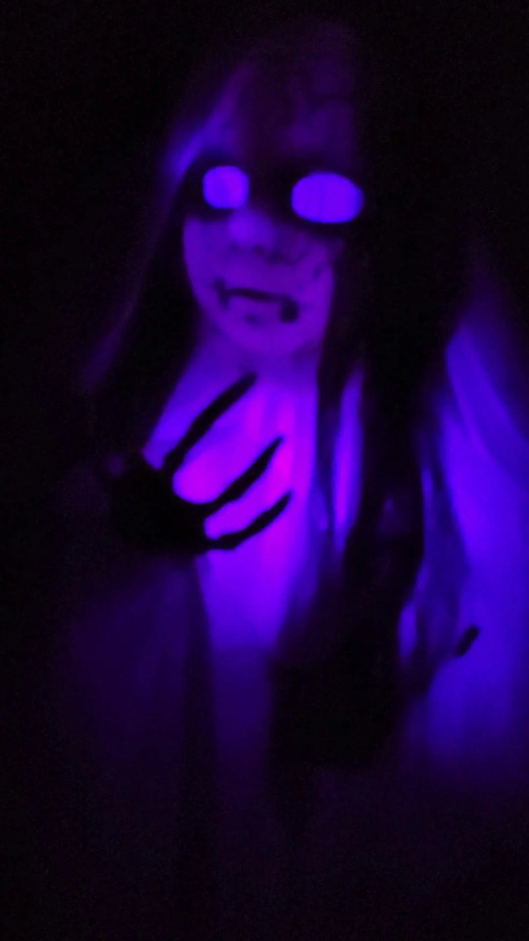 Purple lit ghost at a past Scare Park event