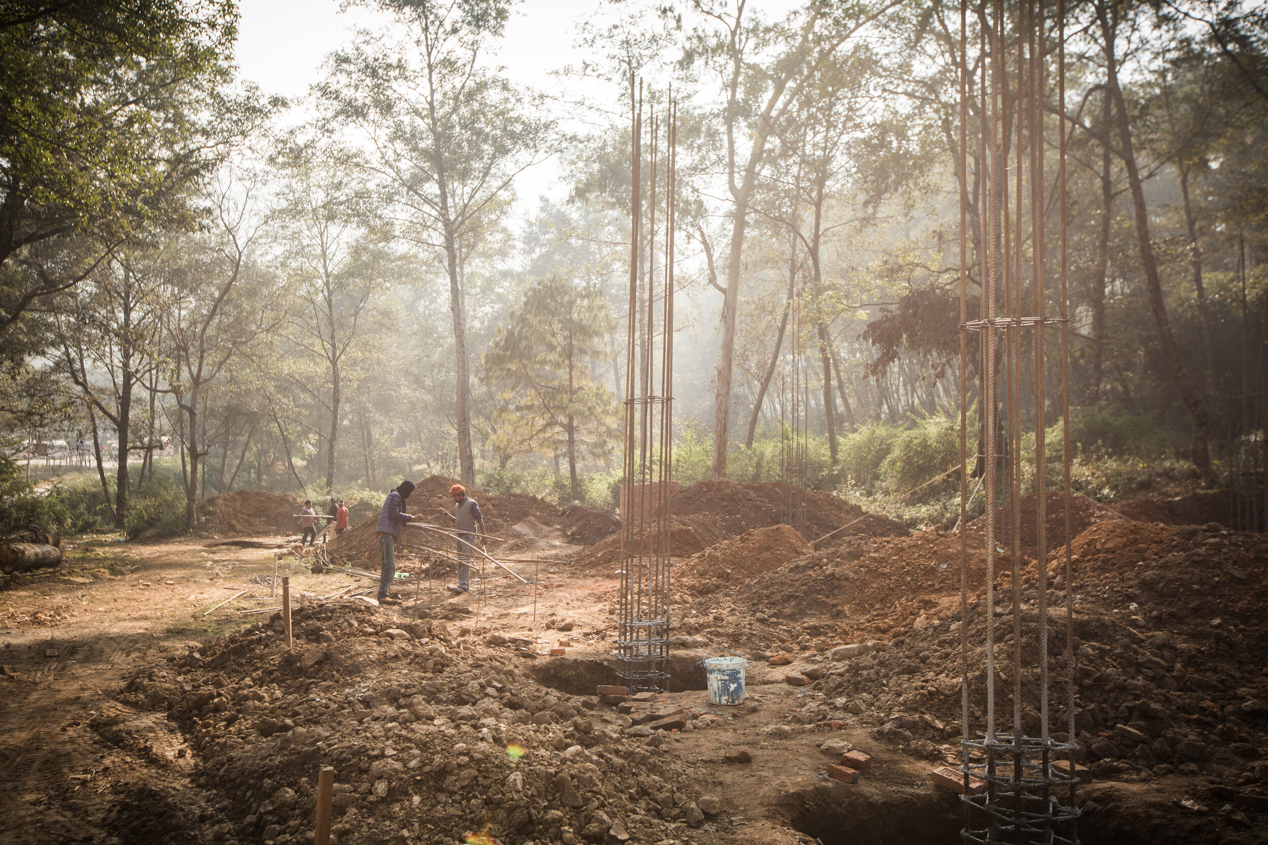 the becoming - manual worker preparing work site in Nepal for construction. ( boys, boyhood, masculinity)