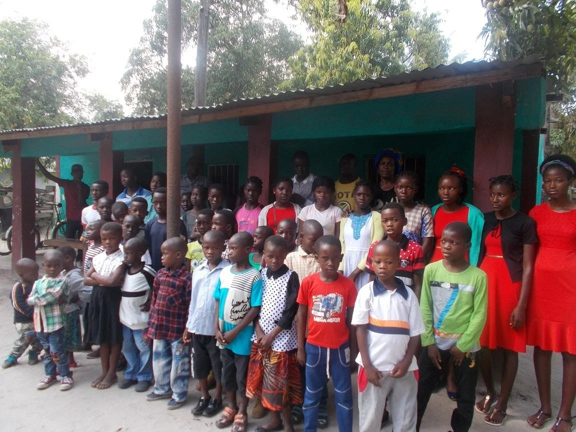 orphan new clothes 2.JPG