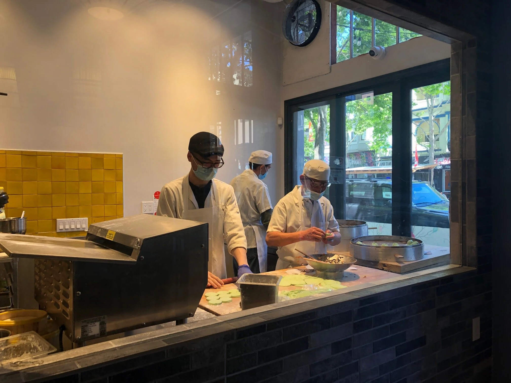 Window into the kitchen from inside of rest 2.jpg