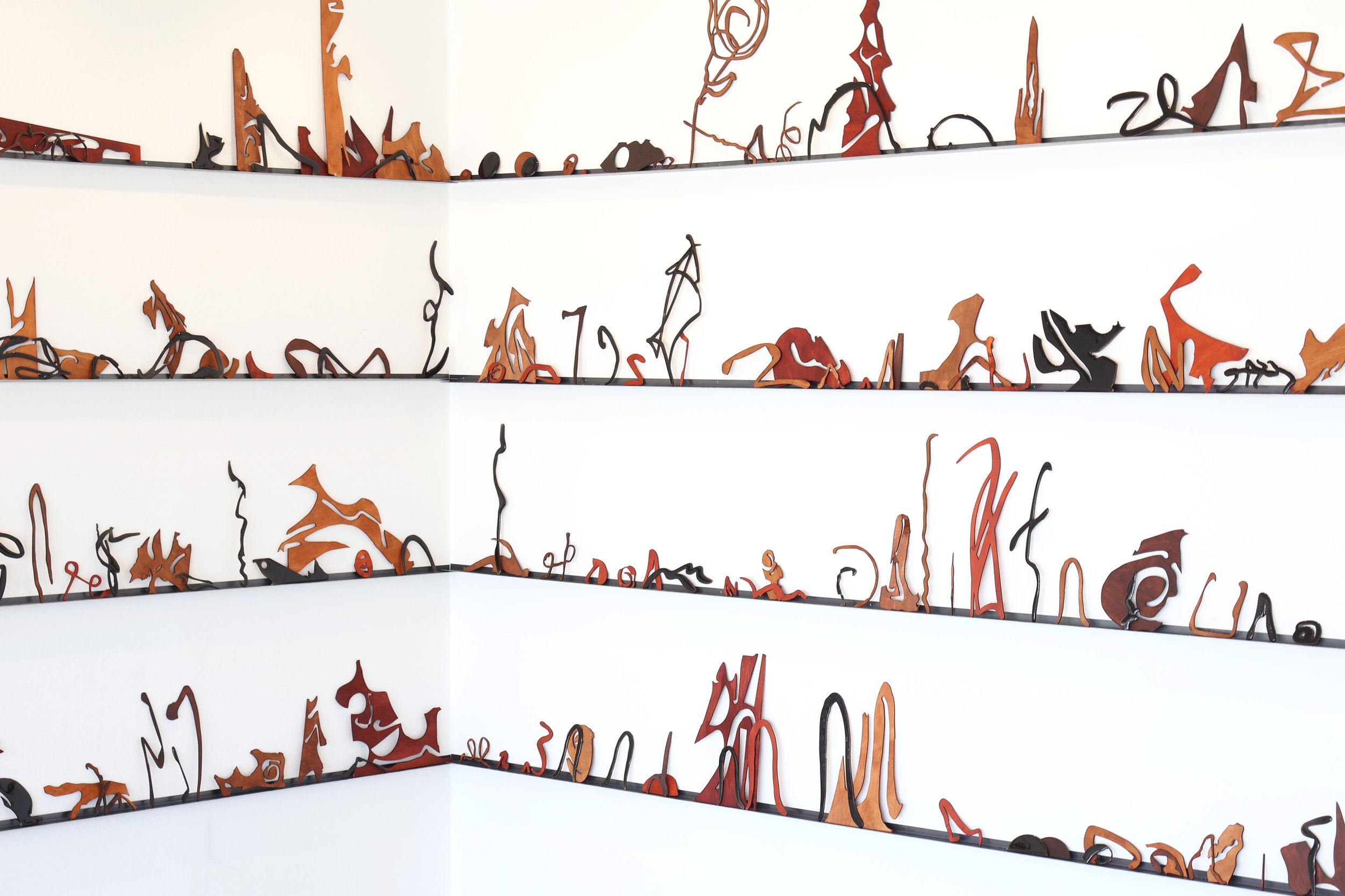Tia Madden, 'Misreading Misreading,' 2025-2026. Plywood, epoxy, pigment, wood stain, steel shelf. Dimensions variable. Image courtesy of the artist