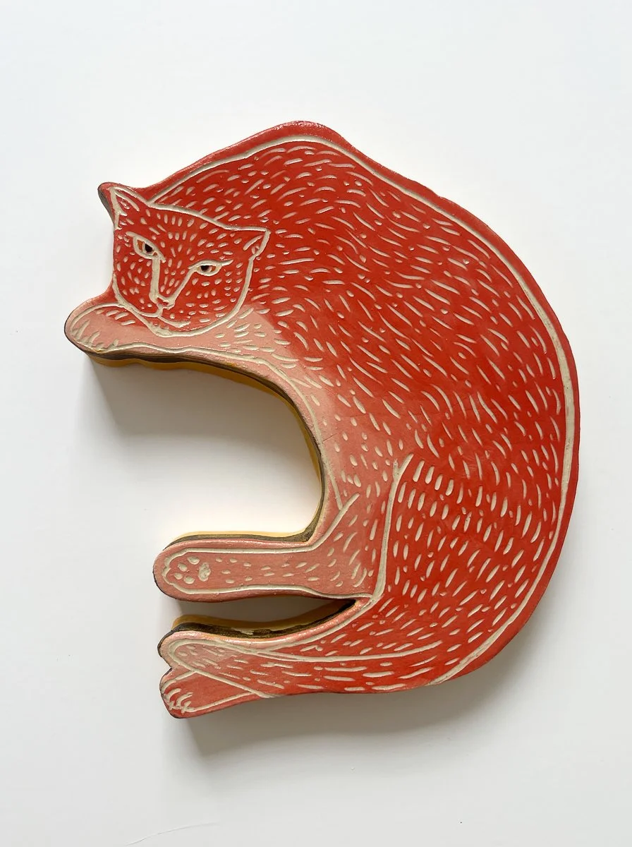 Reclining Cat in Red