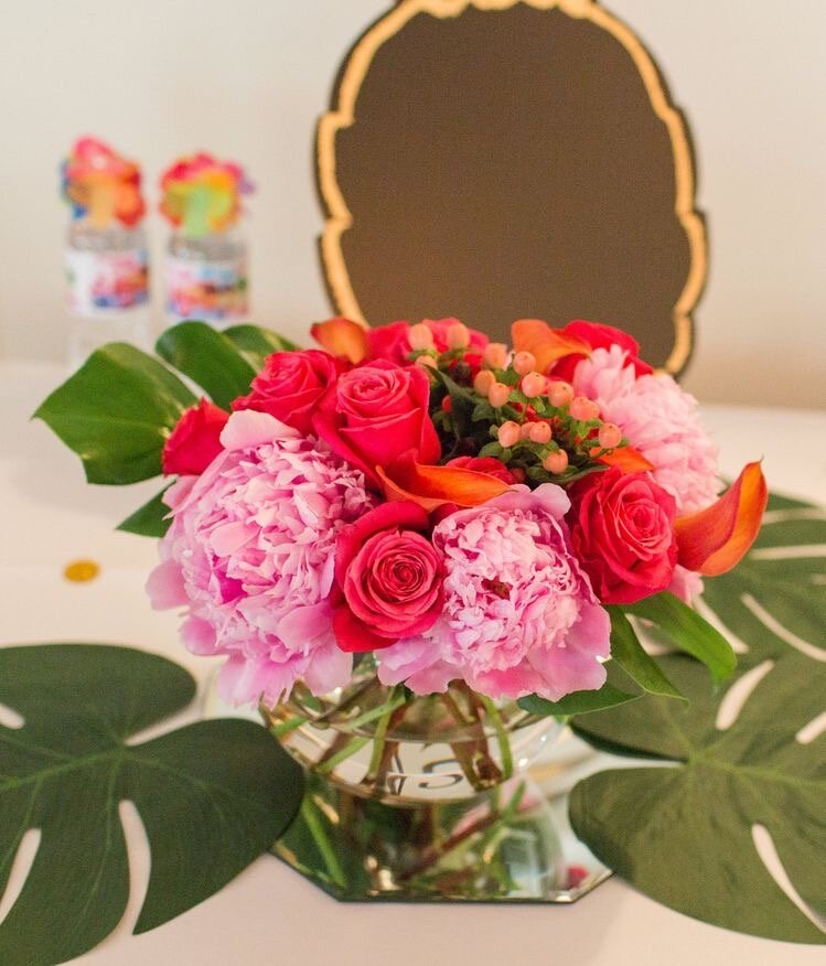 bubble bowl centerpiece with hot pink roses, peonies, Hypericum. Mango callas .jpeg