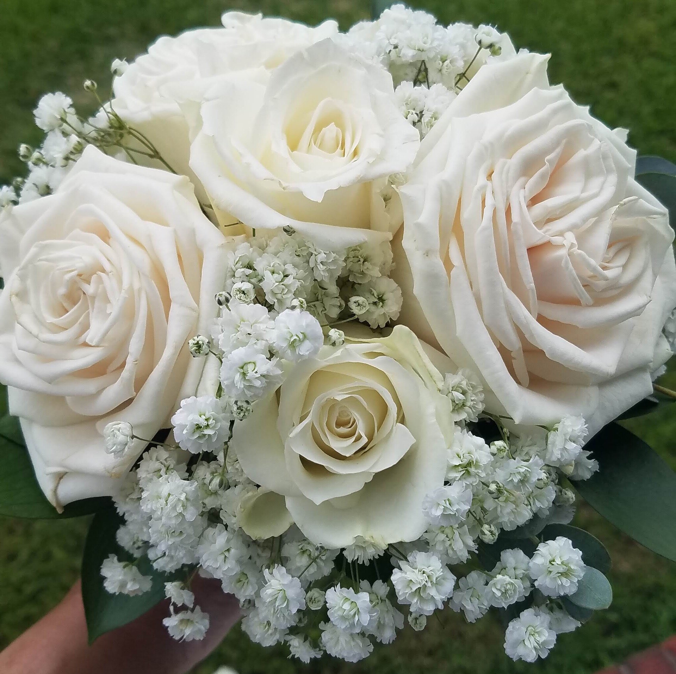 hand tied clutch bouquet of Playa Blanca and Escimo Roses with Baby’s Breath .jpg