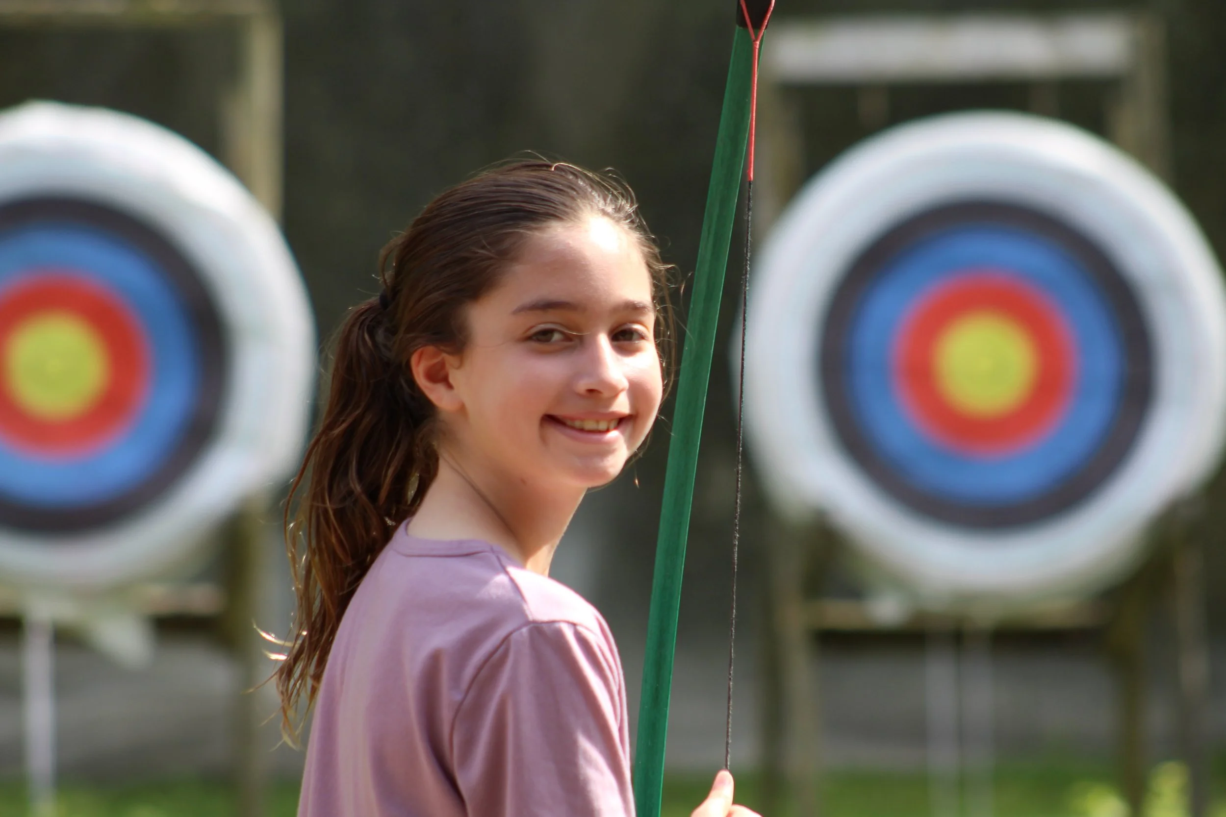 archery with targets in background.JPG