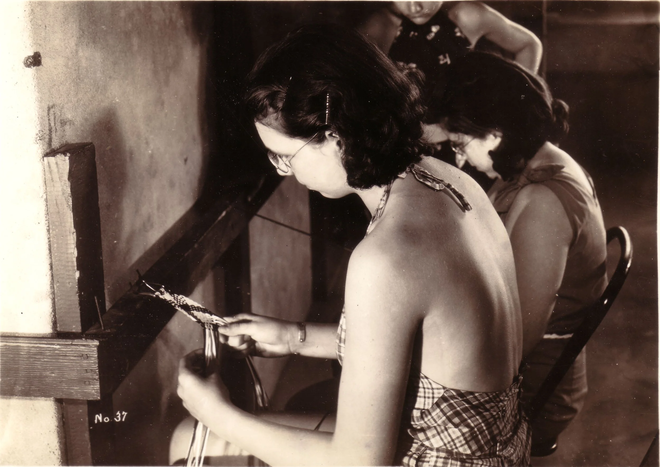 1950s - Girls weaving in the Craft Shop