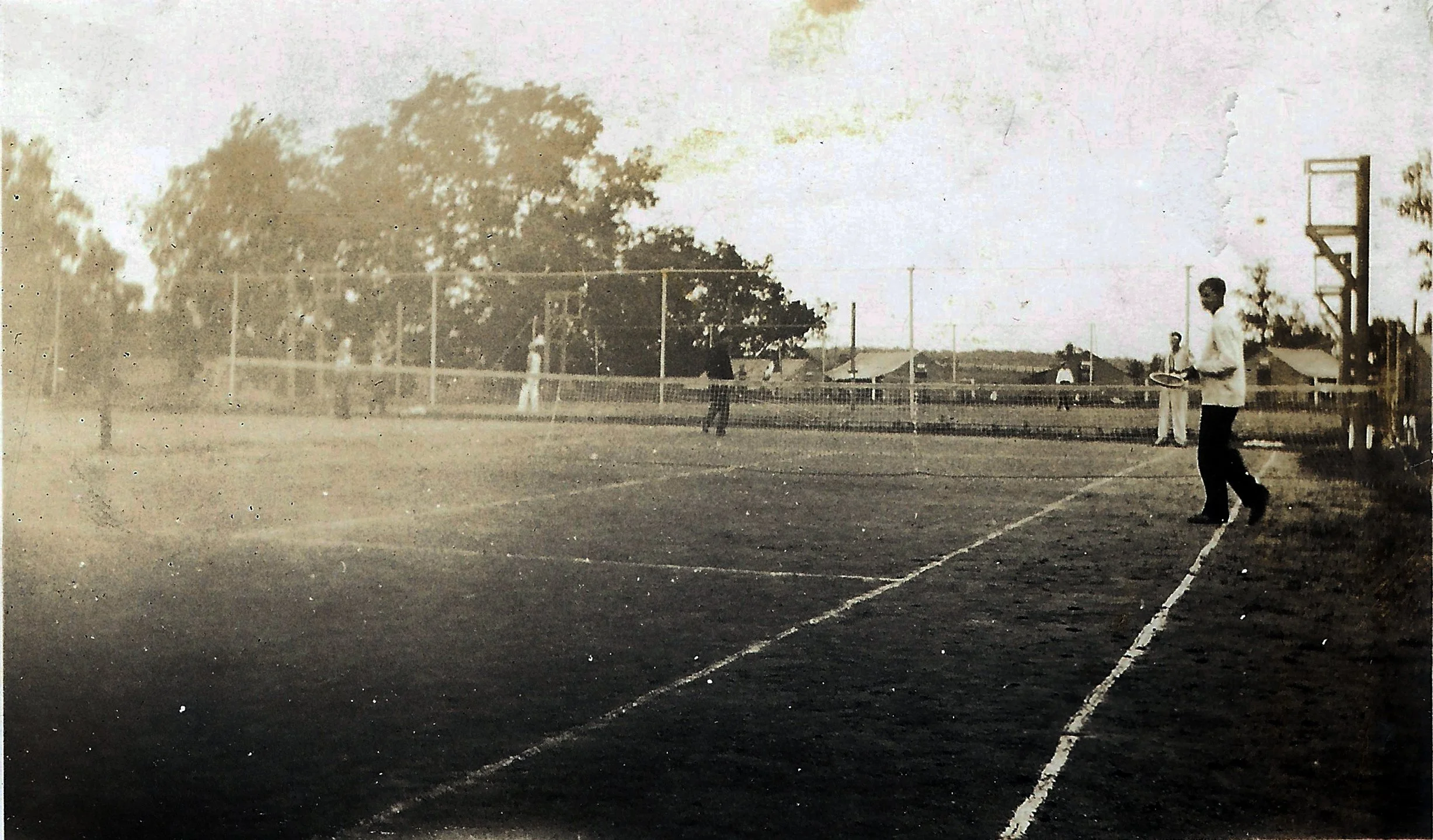 1920s - Campers playing tennis courts on the brand new tennis courts donated by C.B. Voorhis
